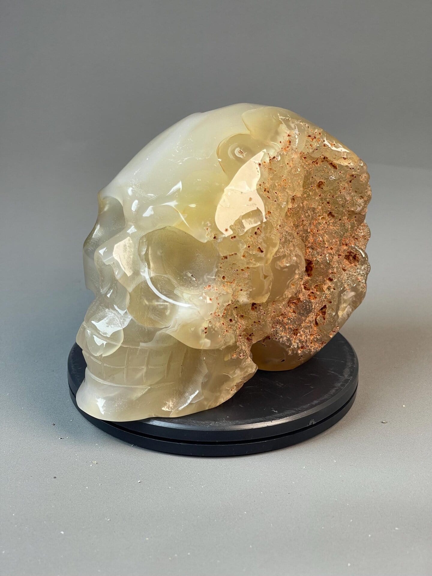 Flower agate skull carving with natural floral moss inclusions