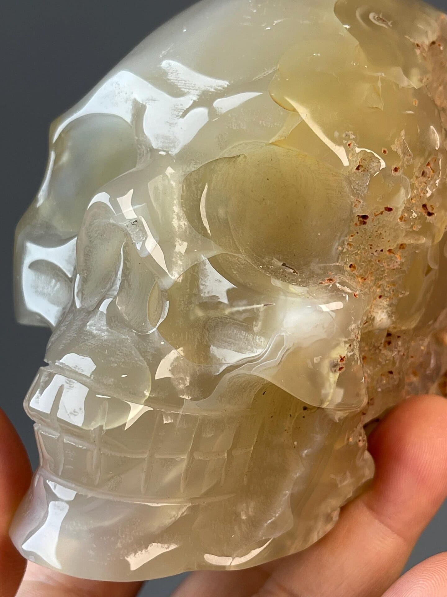 Flower agate skull carving, 29.28 oz, waxy luster