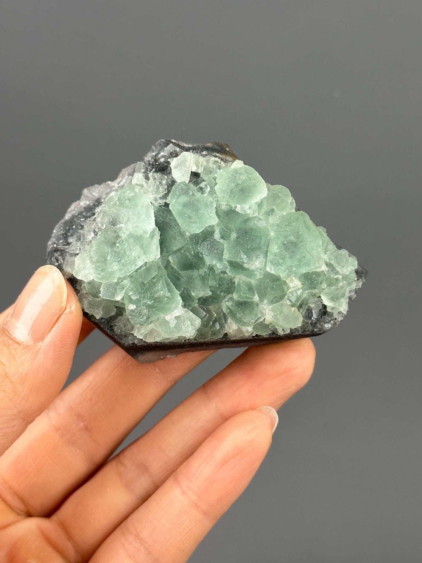 Green fluorite on quartz matrix front view