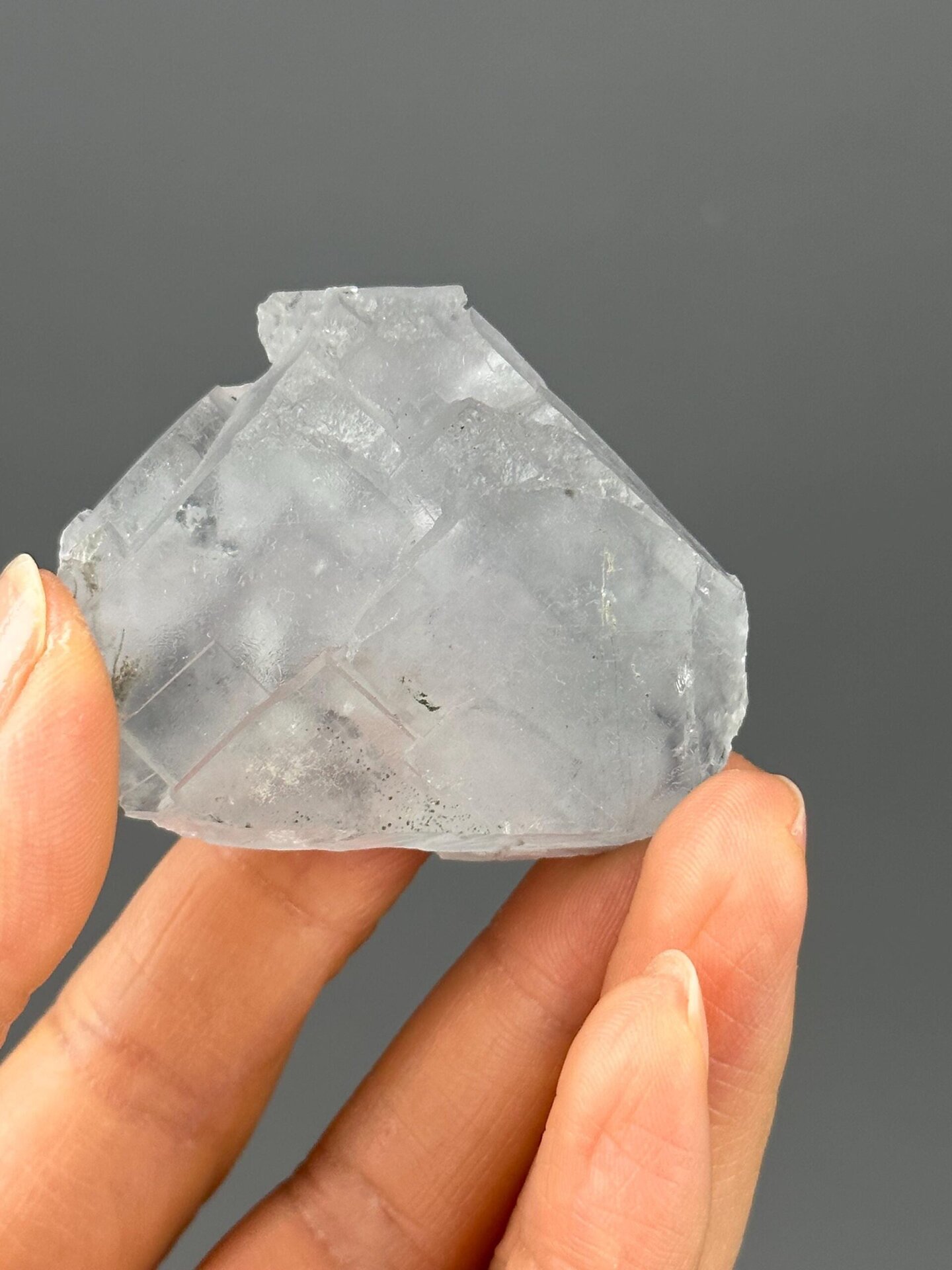 Side view of white fluorite with blue phantom specimen