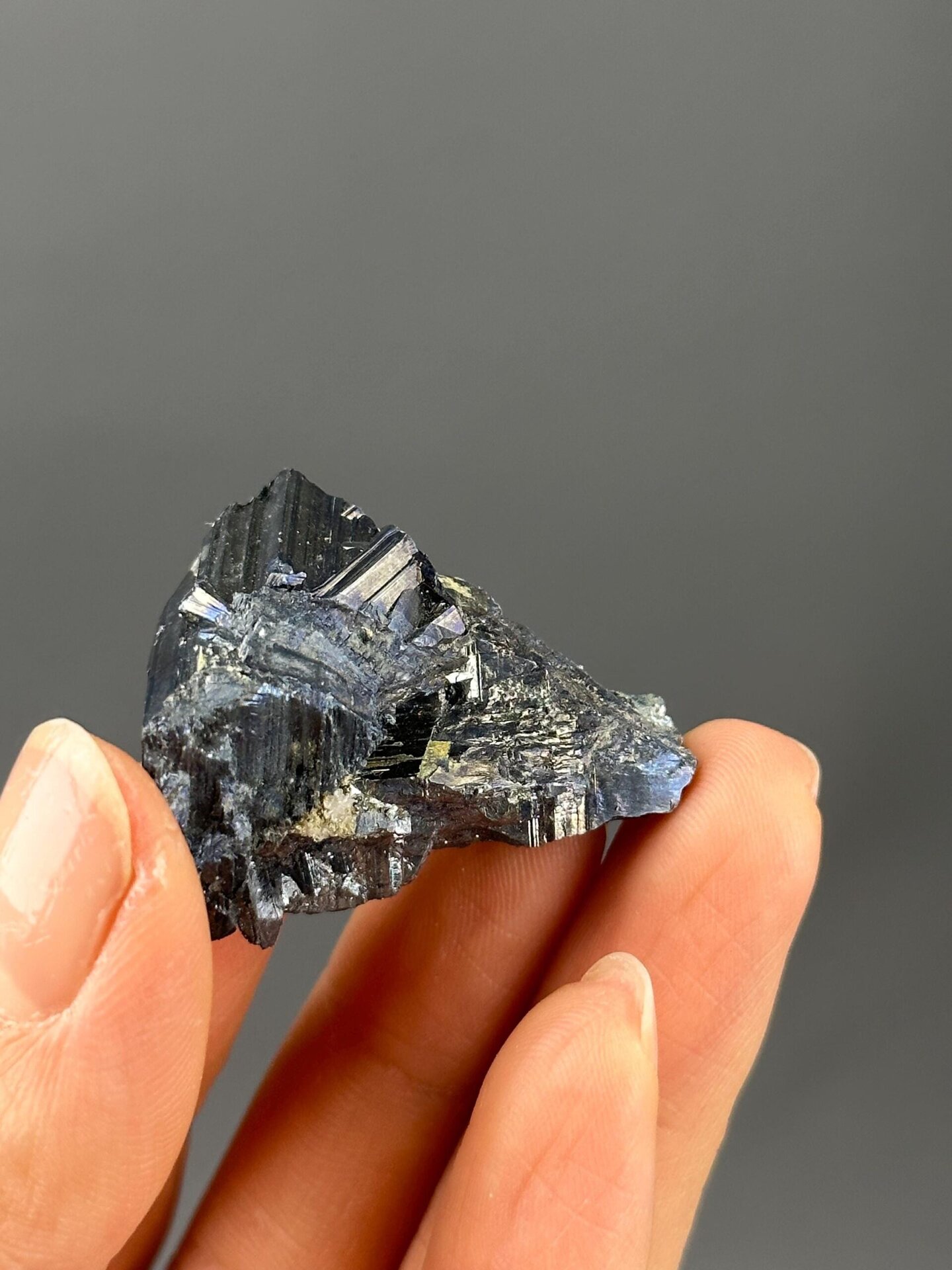 Stibnite crystal tips metallic sheen detail