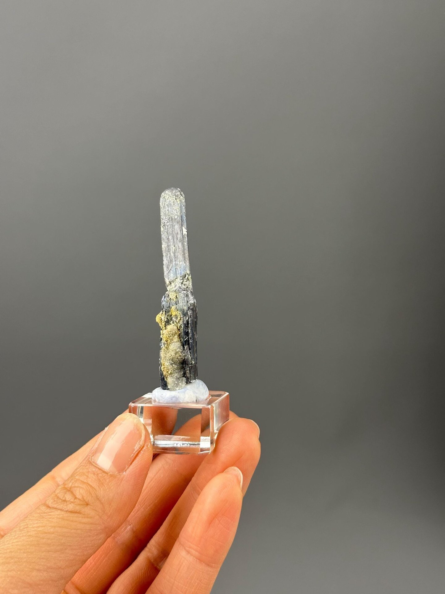 Full stibnite high-luster specimen on white background