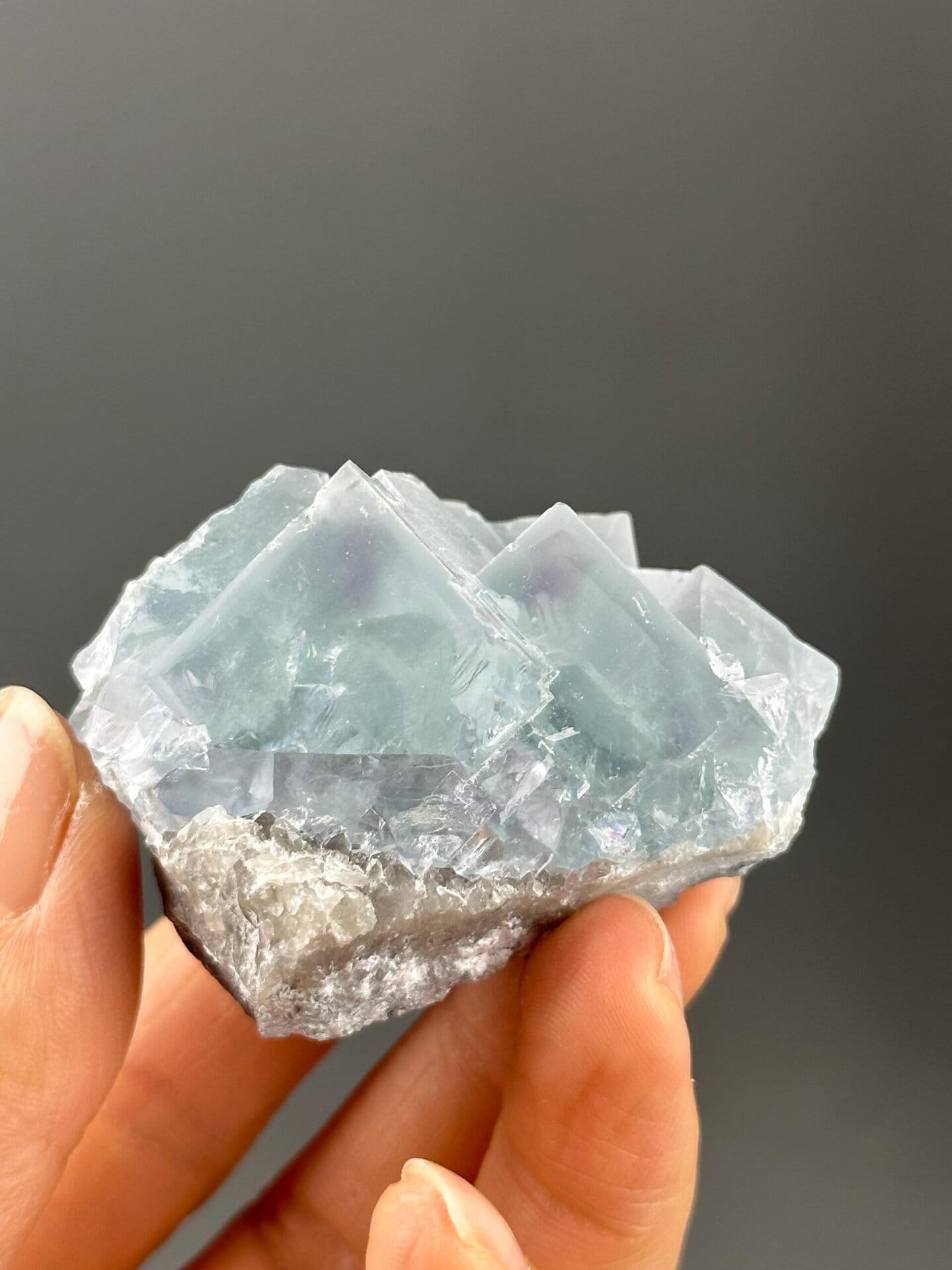 Yaogangxian fluorite under studio lighting showing bicolor