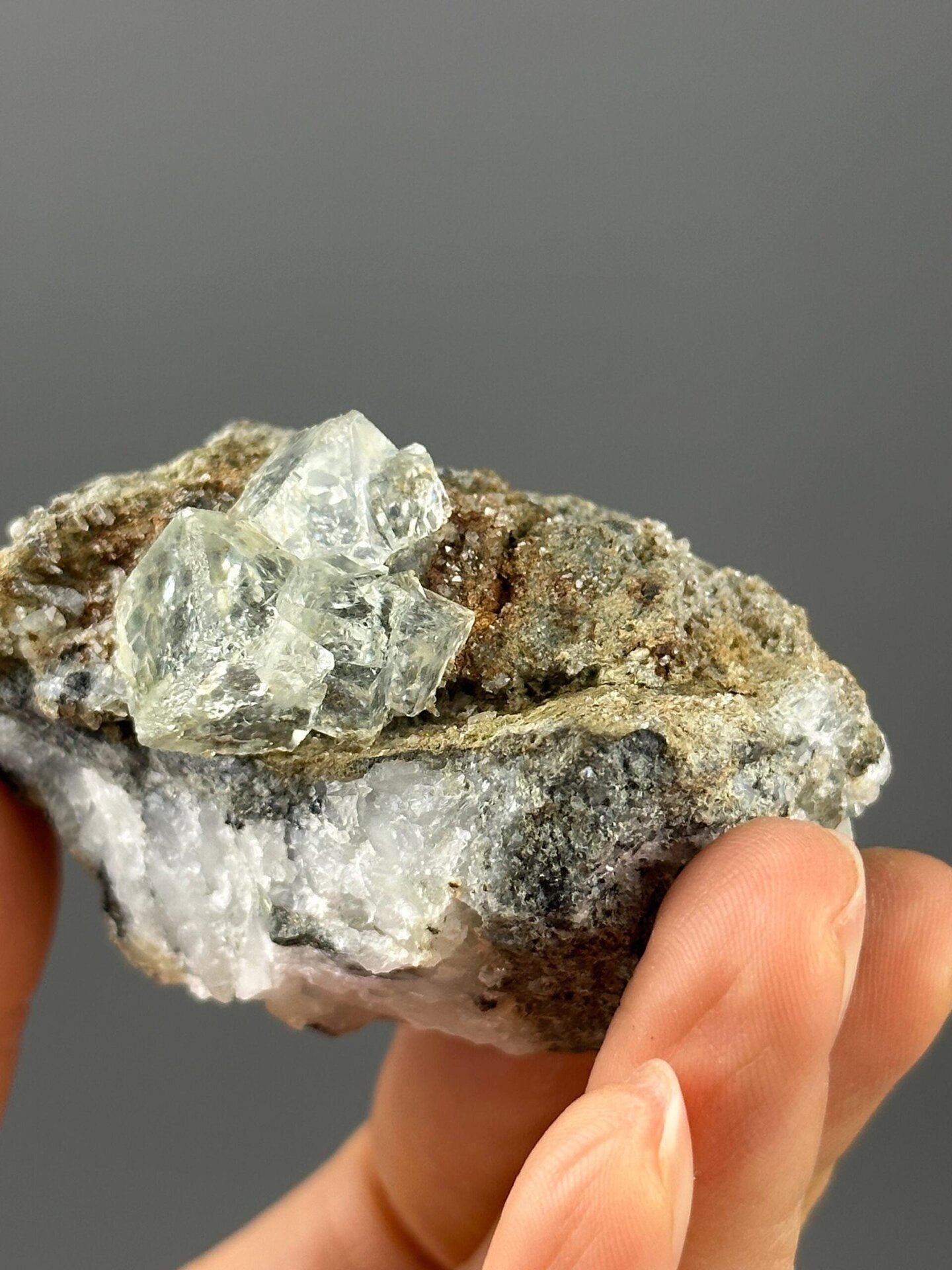 Xianghualing green fluorite under studio lighting