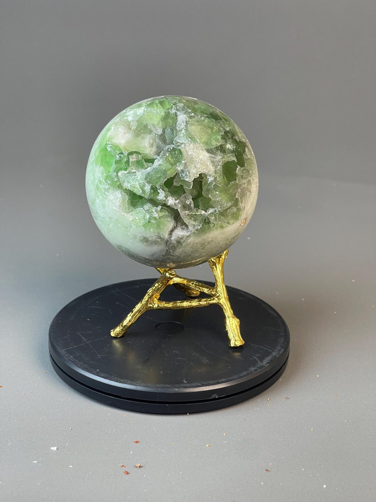 CaF₂ isometric green fluorite carved into polished sphere form
