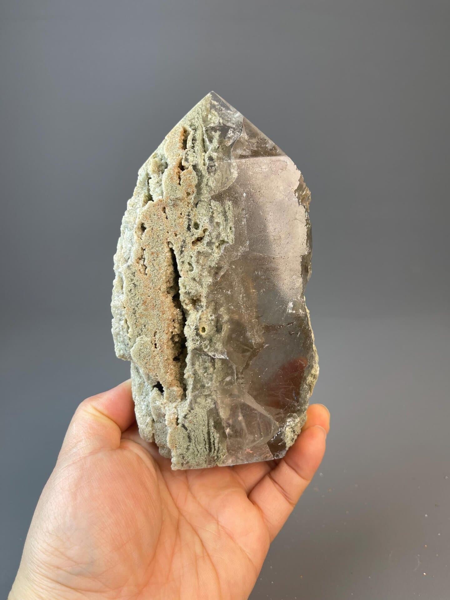 Hand-carved calcite tower with vitreous to waxy luster