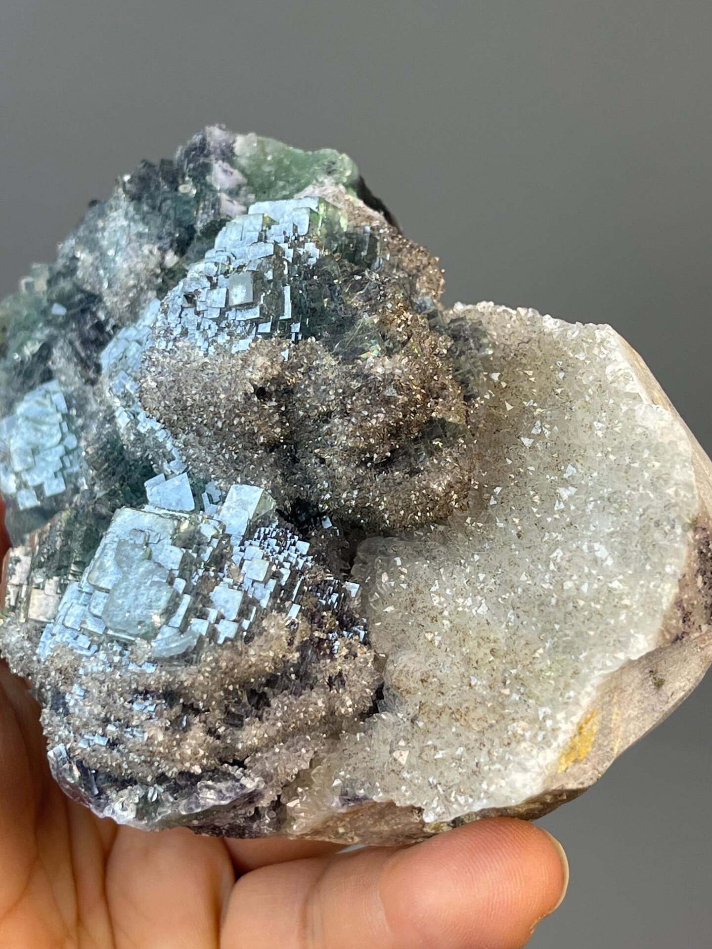 Botryoidal fluorite on quartz measuring 4.55×3.2×2.1 inches