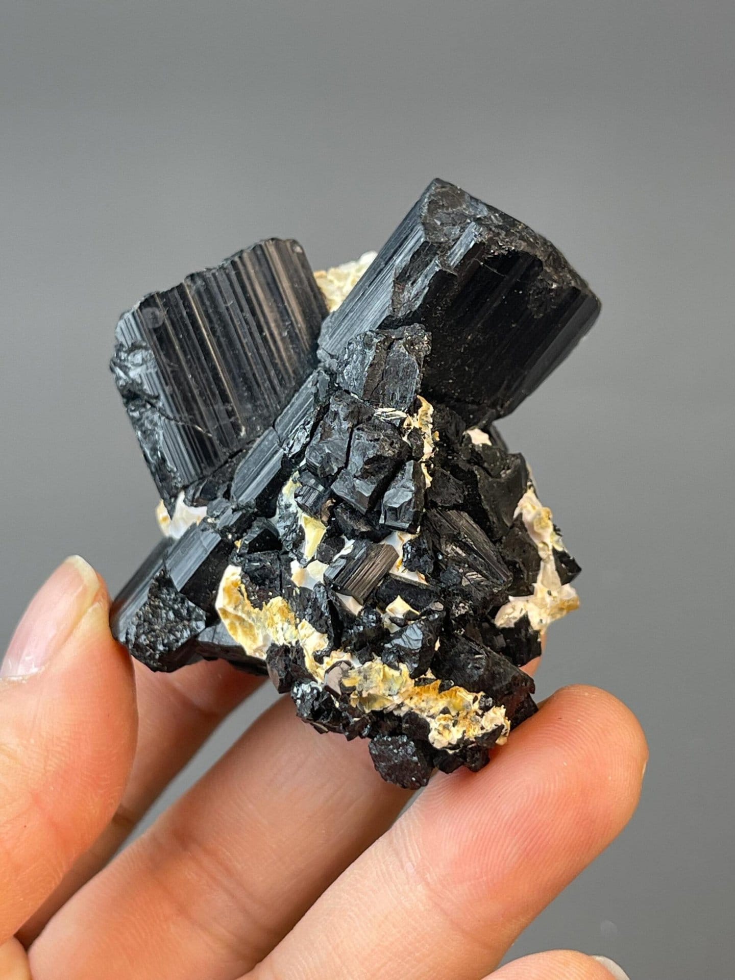 Black tourmaline schorl in X-shaped cluster formation