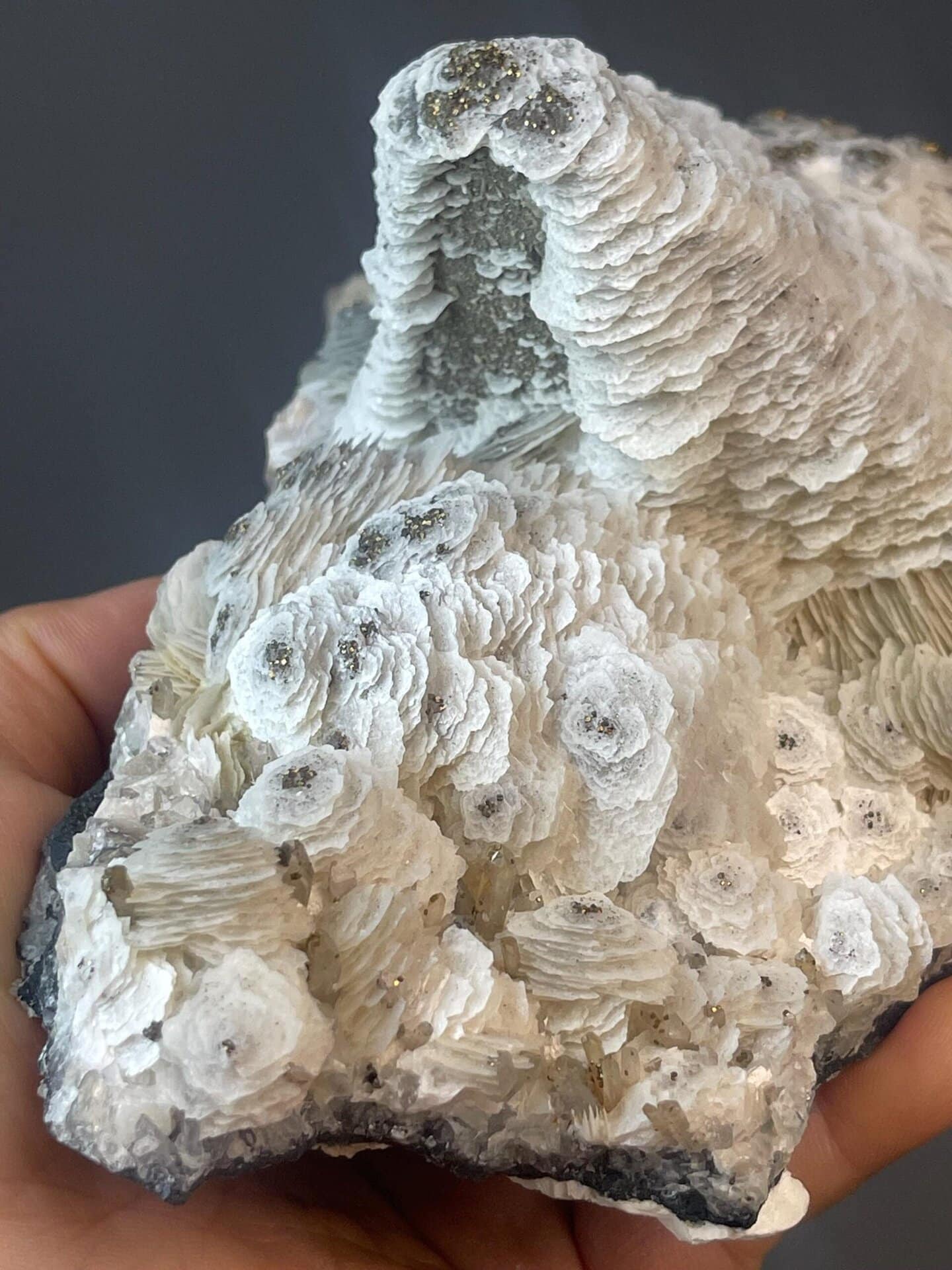 Large petal calcite with pyrite, 35.1 oz, vitreous luster