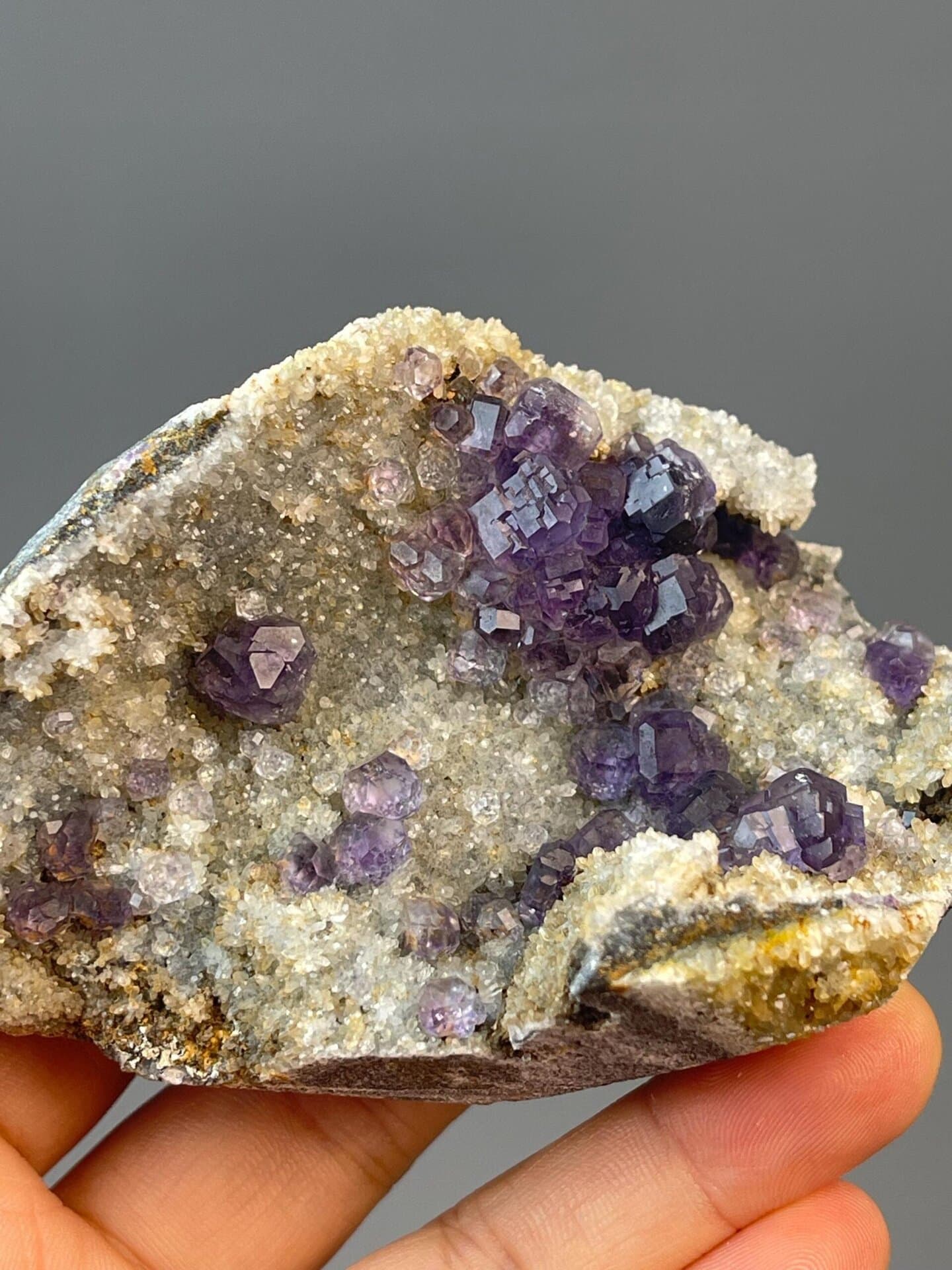Tanzan fluorite spheres on quartz measuring 4.1×2.6×1.6 inches