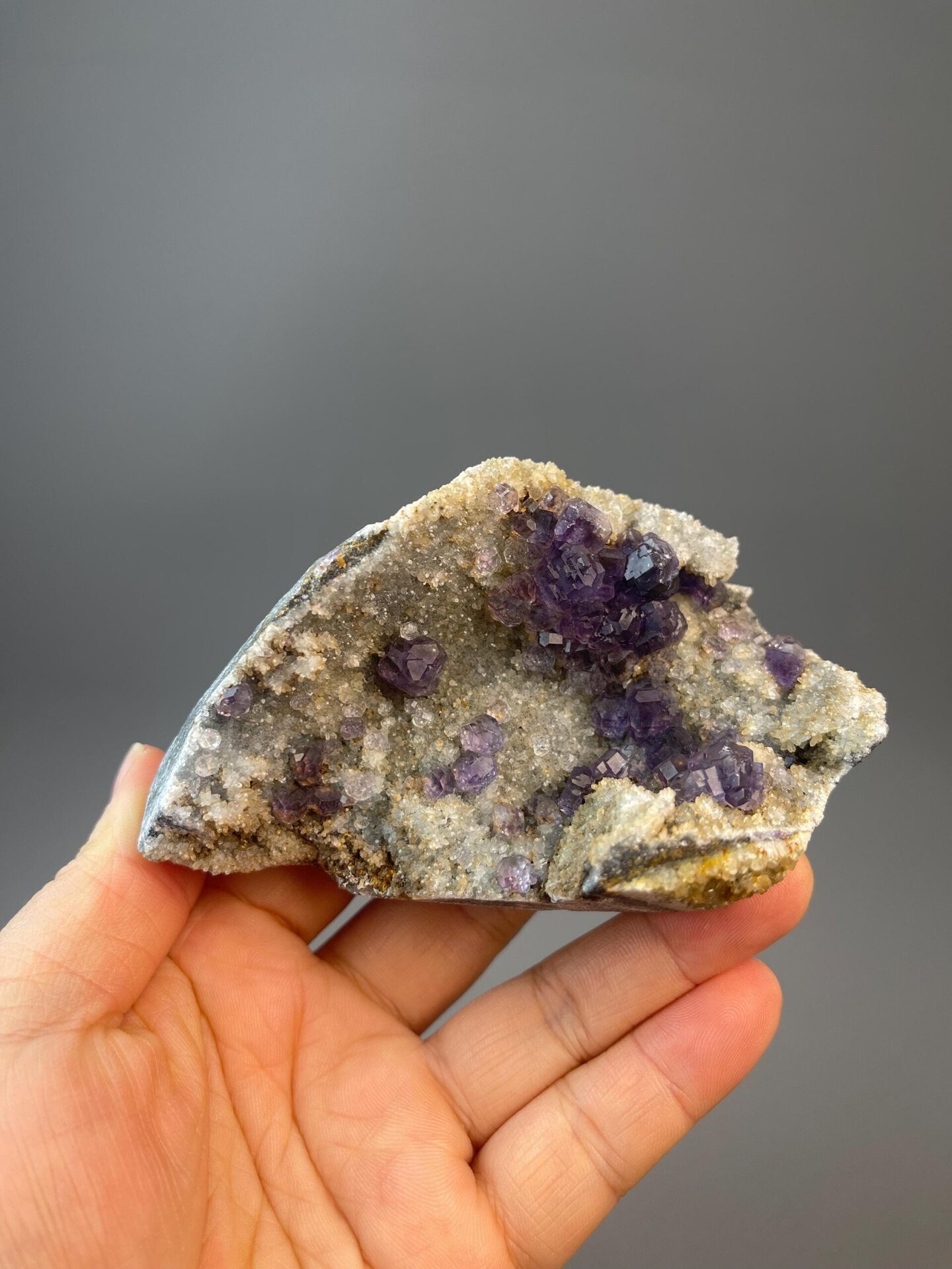 Tanzan fluorite polished spheres on white quartz matrix, Fujian