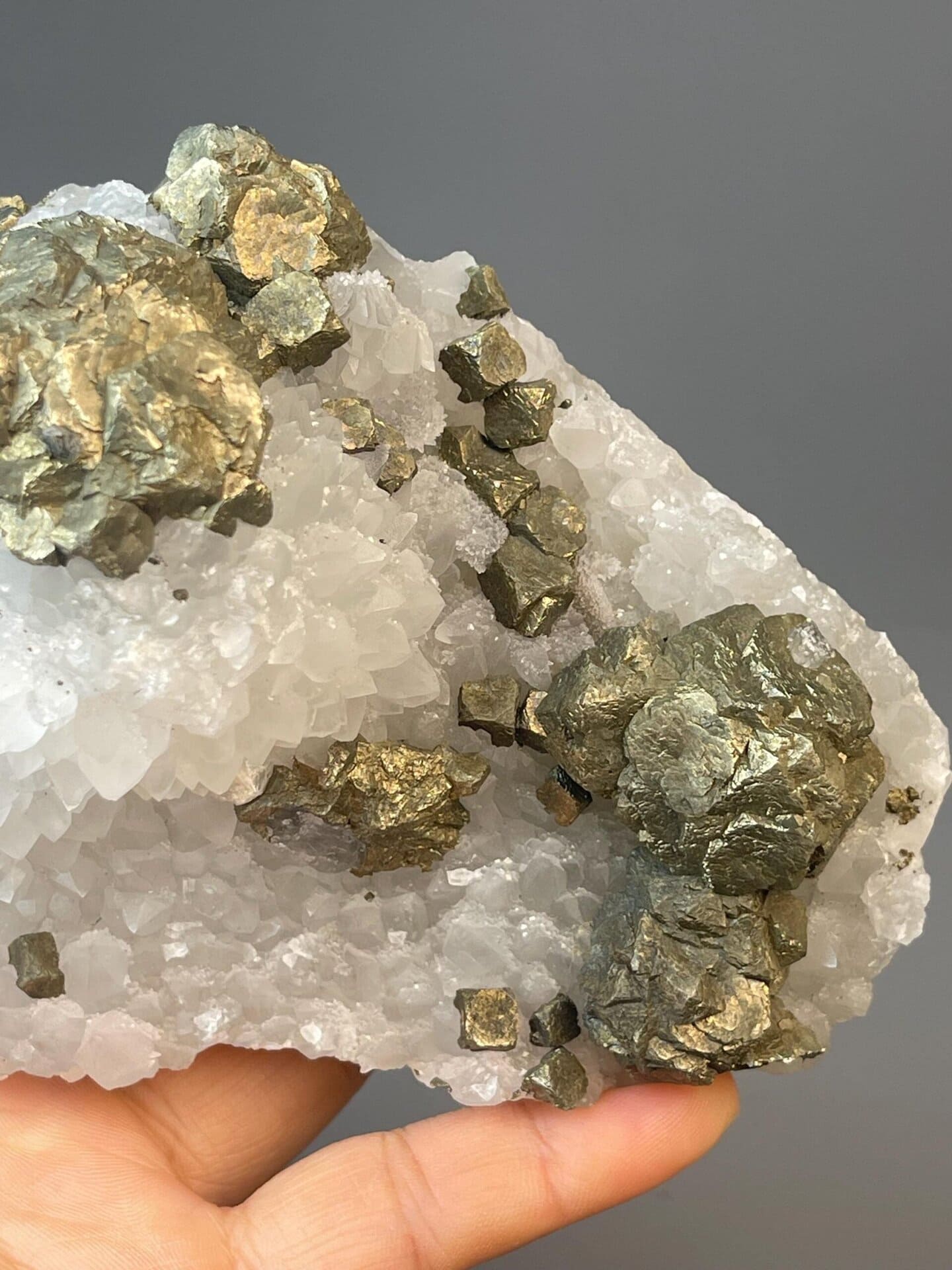 Chalcopyrite with iridescent color play on white quartz matrix