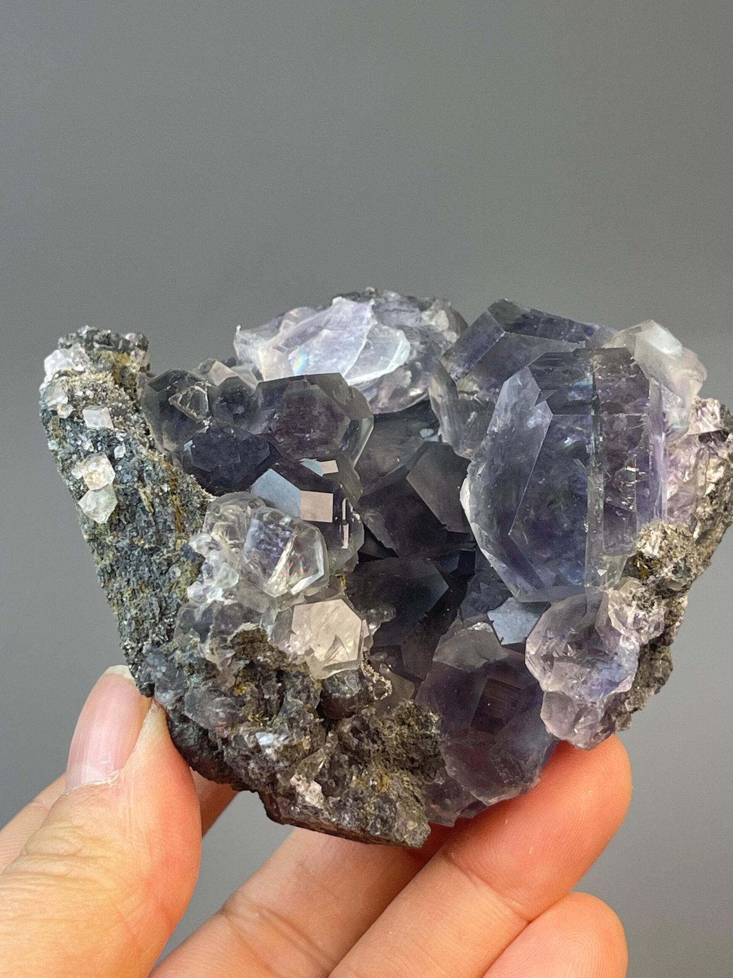 Rare tanzan fluorite with phantom zones and window face
