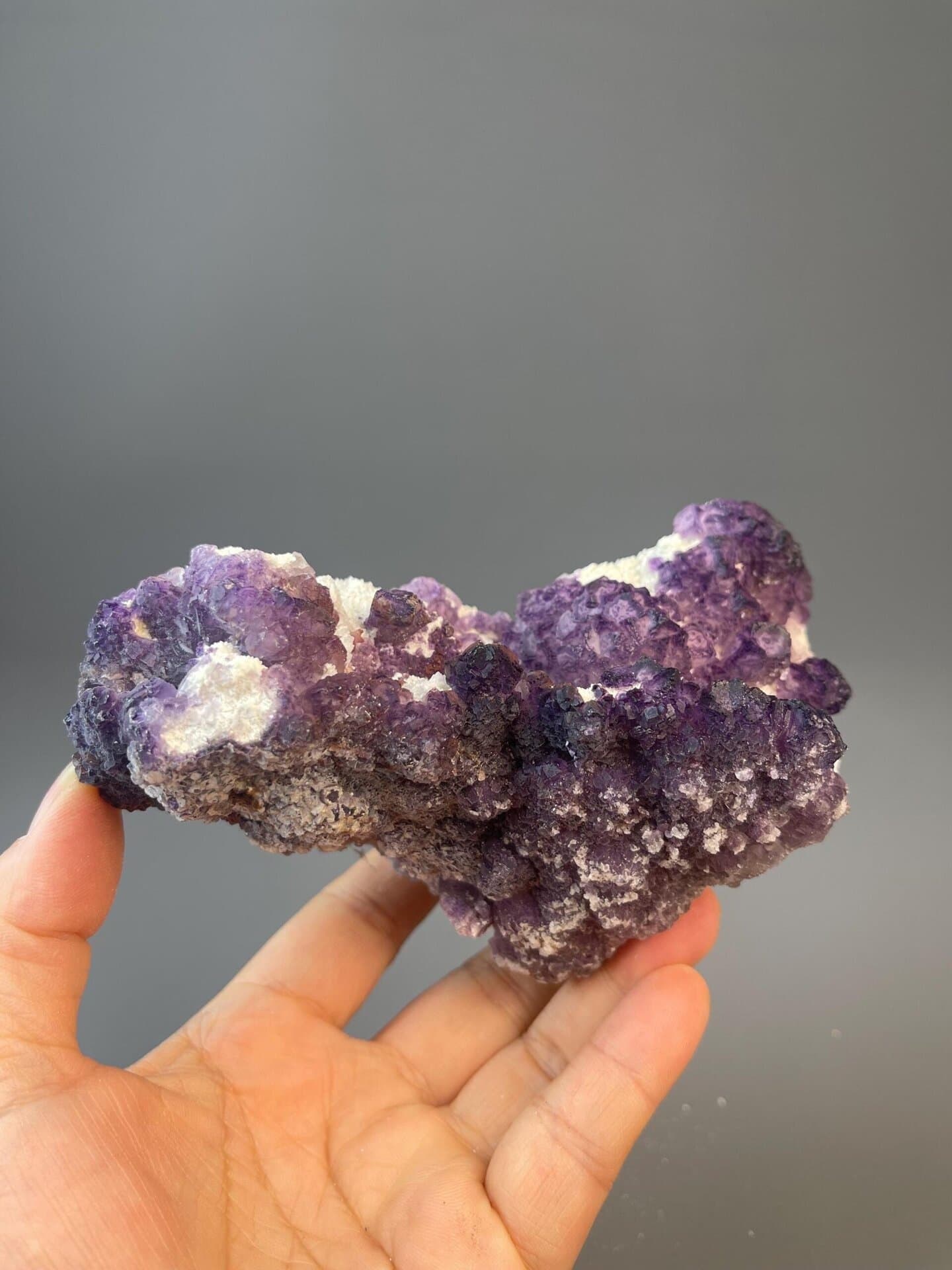Fan-shaped purple fluorite on matrix from Guizhou, China