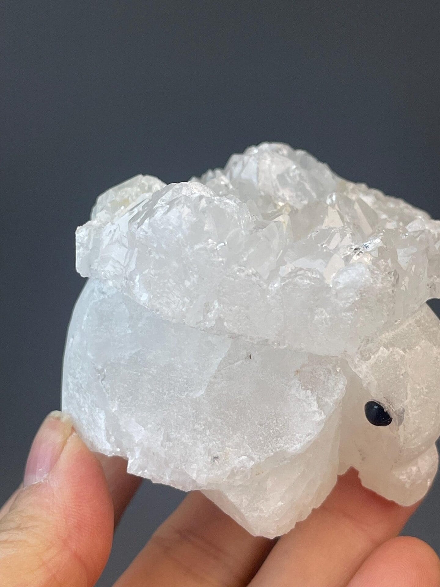 Clear quartz mineral art elephant with detailed trunk and ears