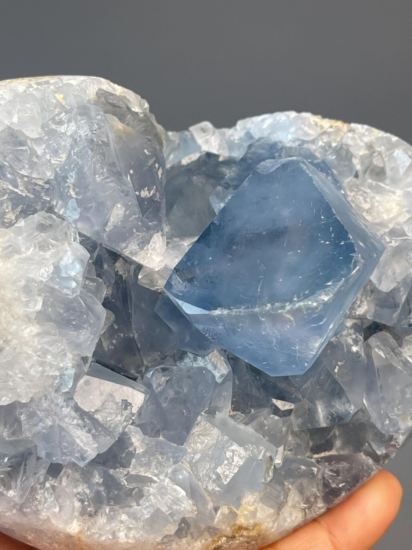 Sky blue celestite heart carving with radiating crystal clusters