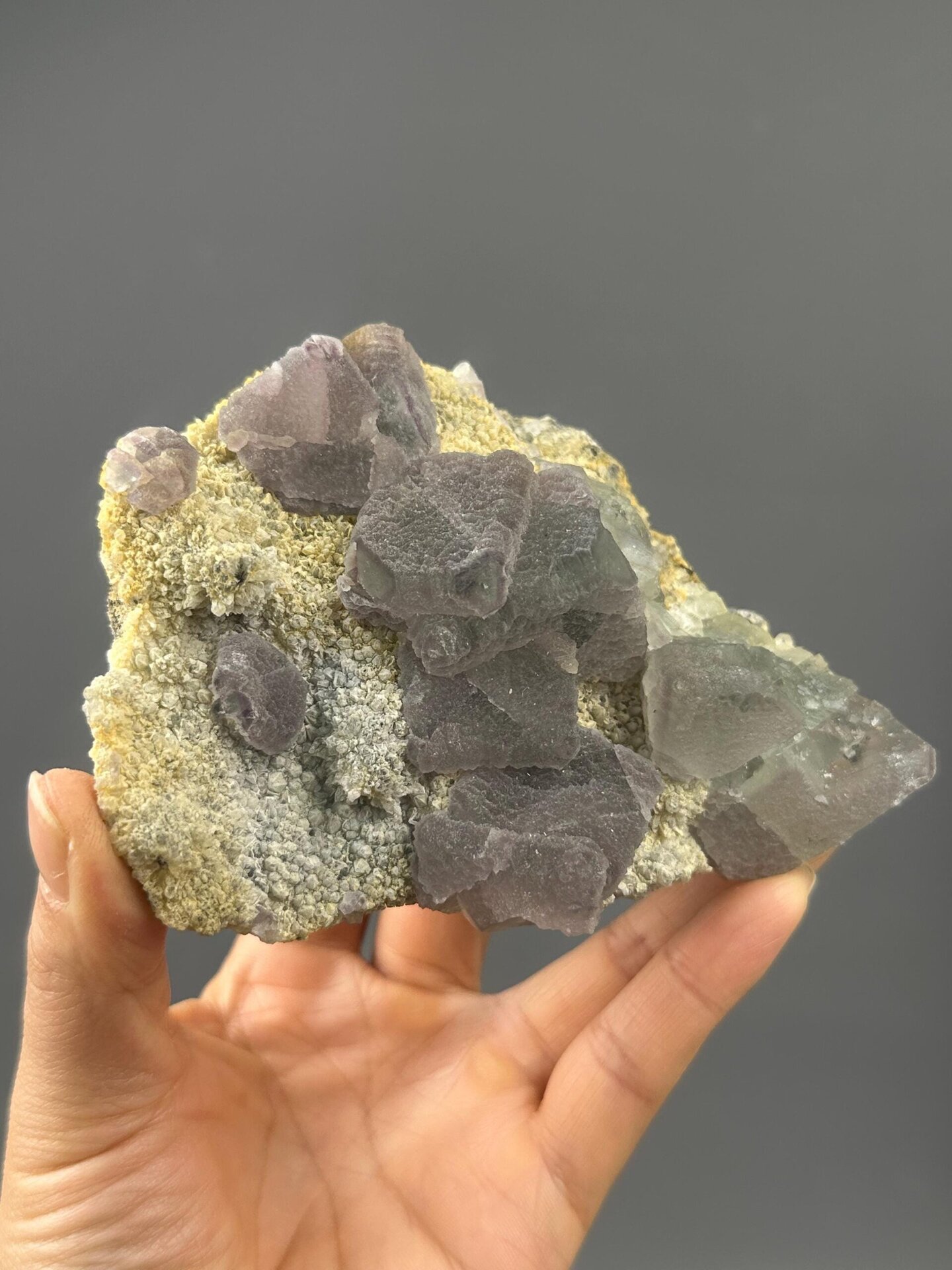 Side view of large fluorite cluster showing crystal depth