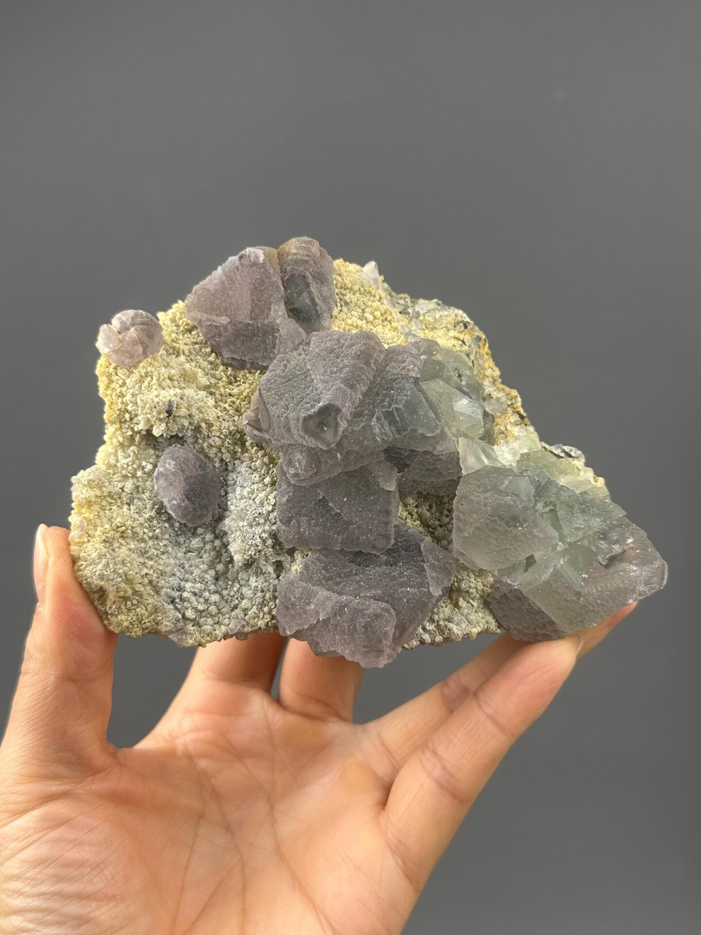 Front view of large purple fluorite cluster, 4.8×3.6×1.7 in