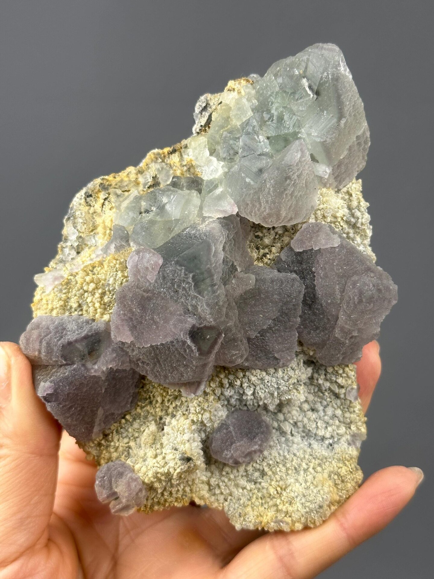 Large purple fluorite crystal cluster on rock base from Guizhou Province, China
