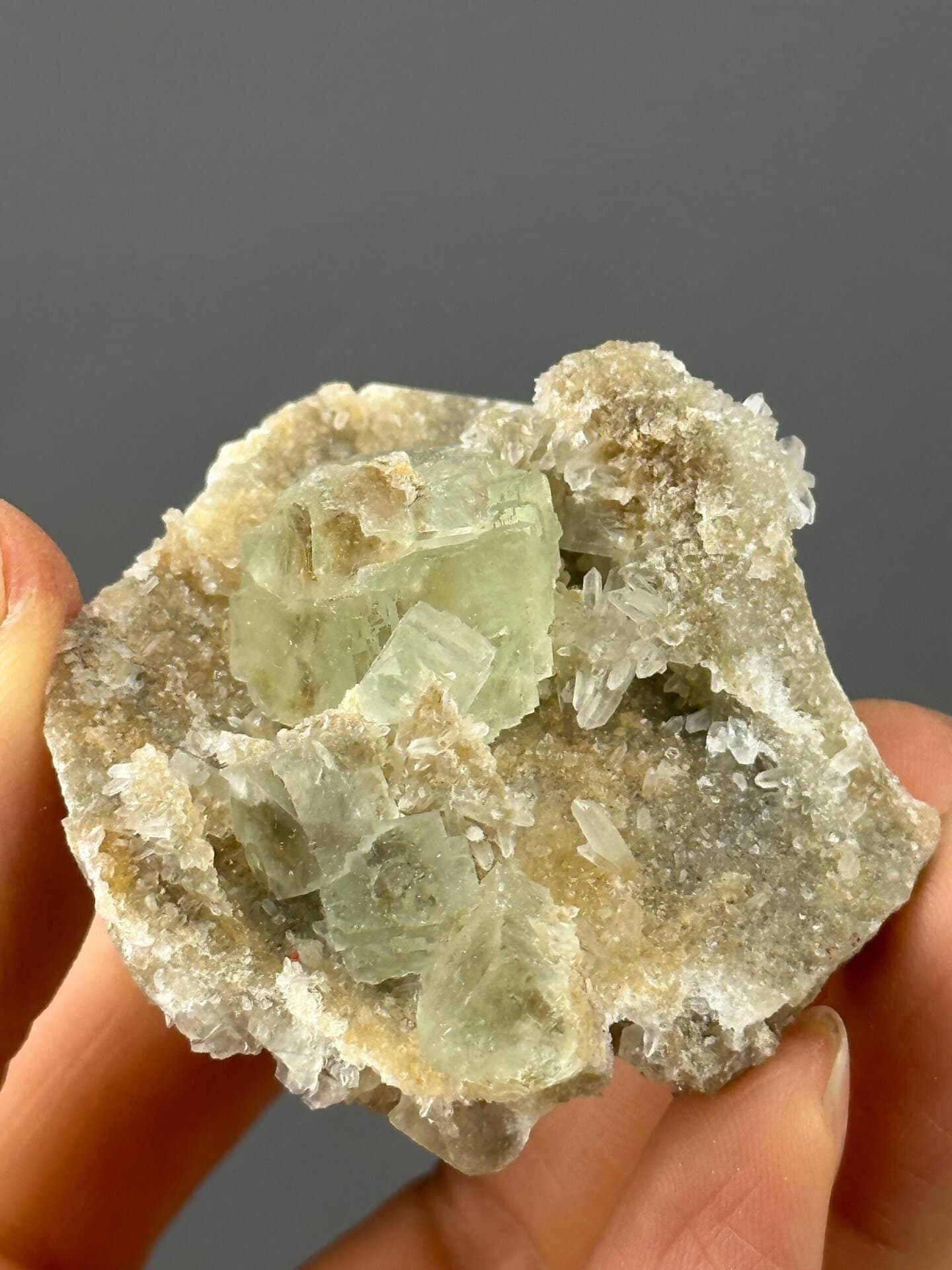 Front view of green fluorite-quartz association, 2.3×2×0.9 in