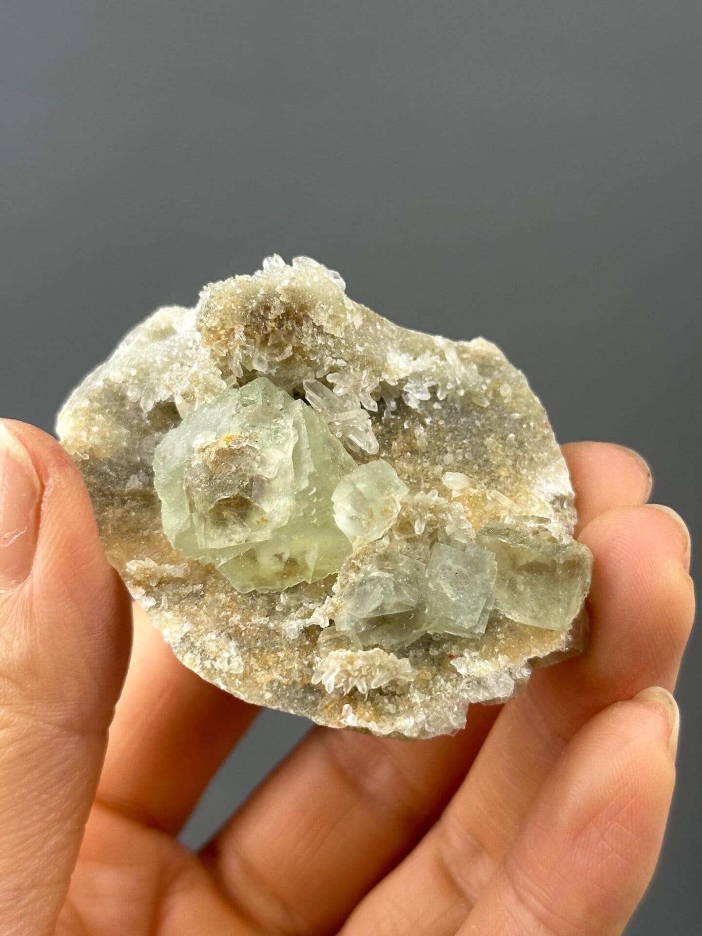 Detail of fluorite crystal on quartz surface