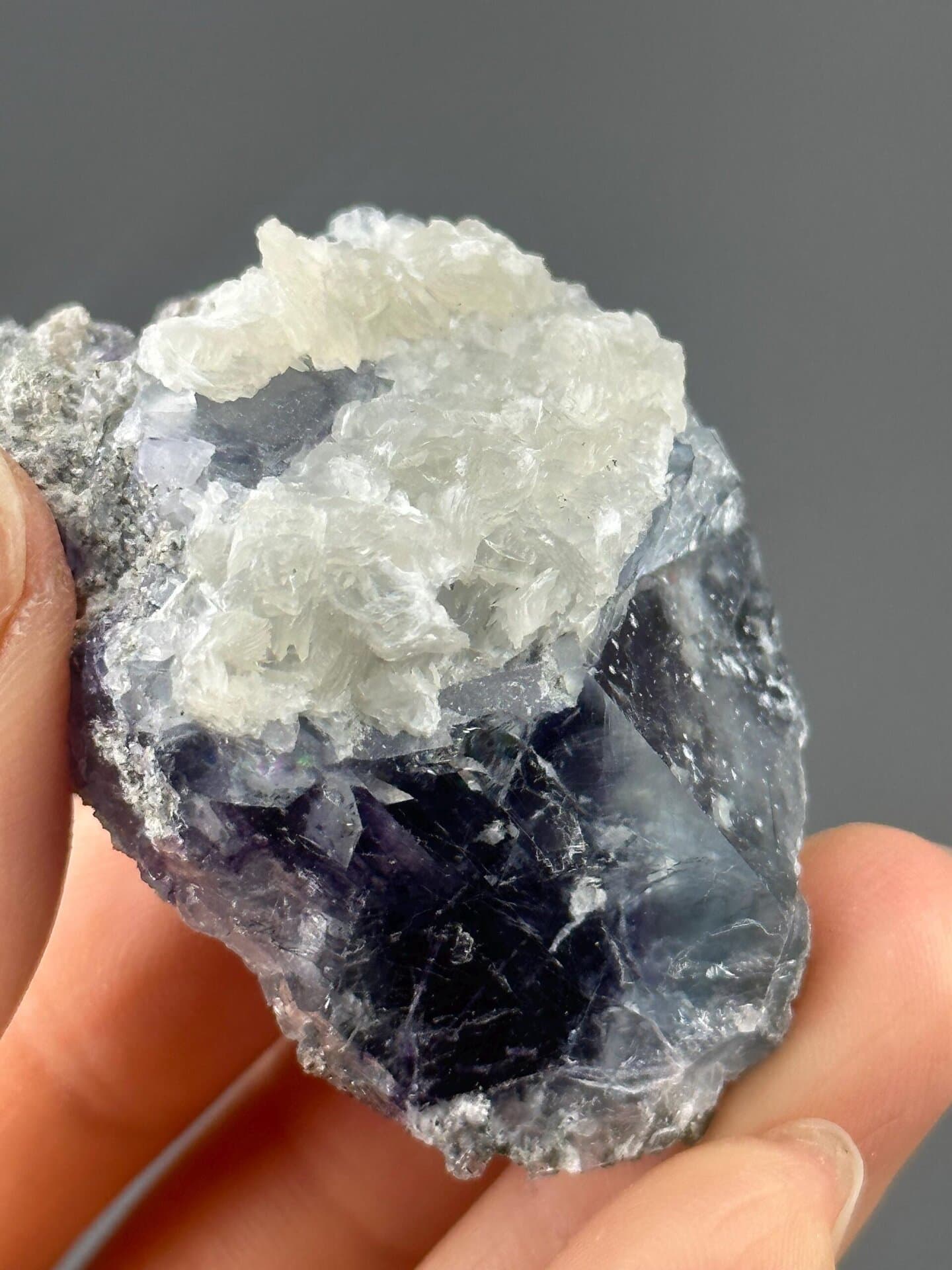 Angled view of purple twinned fluorite cluster
