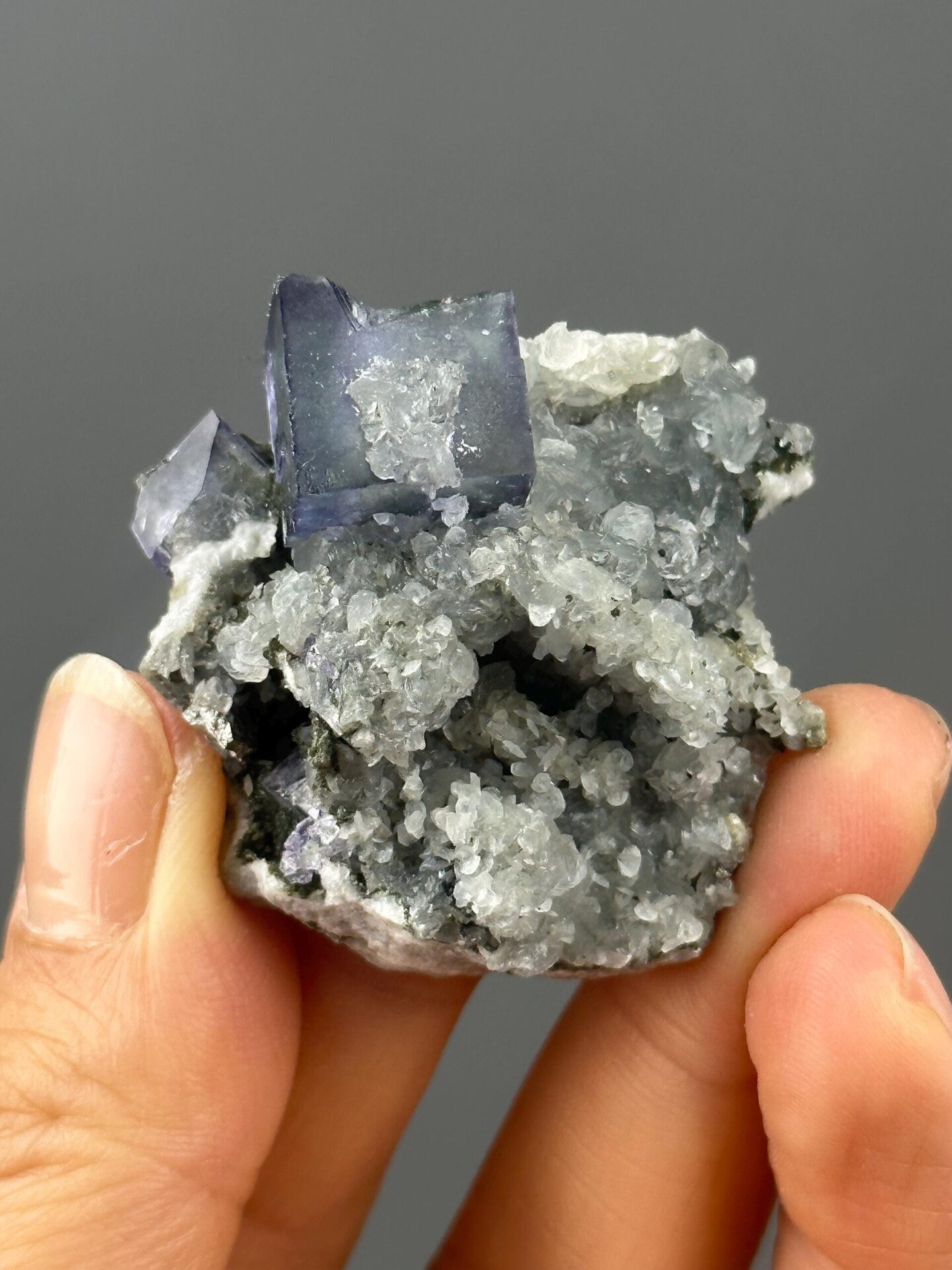 Twinned purple phantom fluorite with quartz from Yaogangxian Mine, Hunan