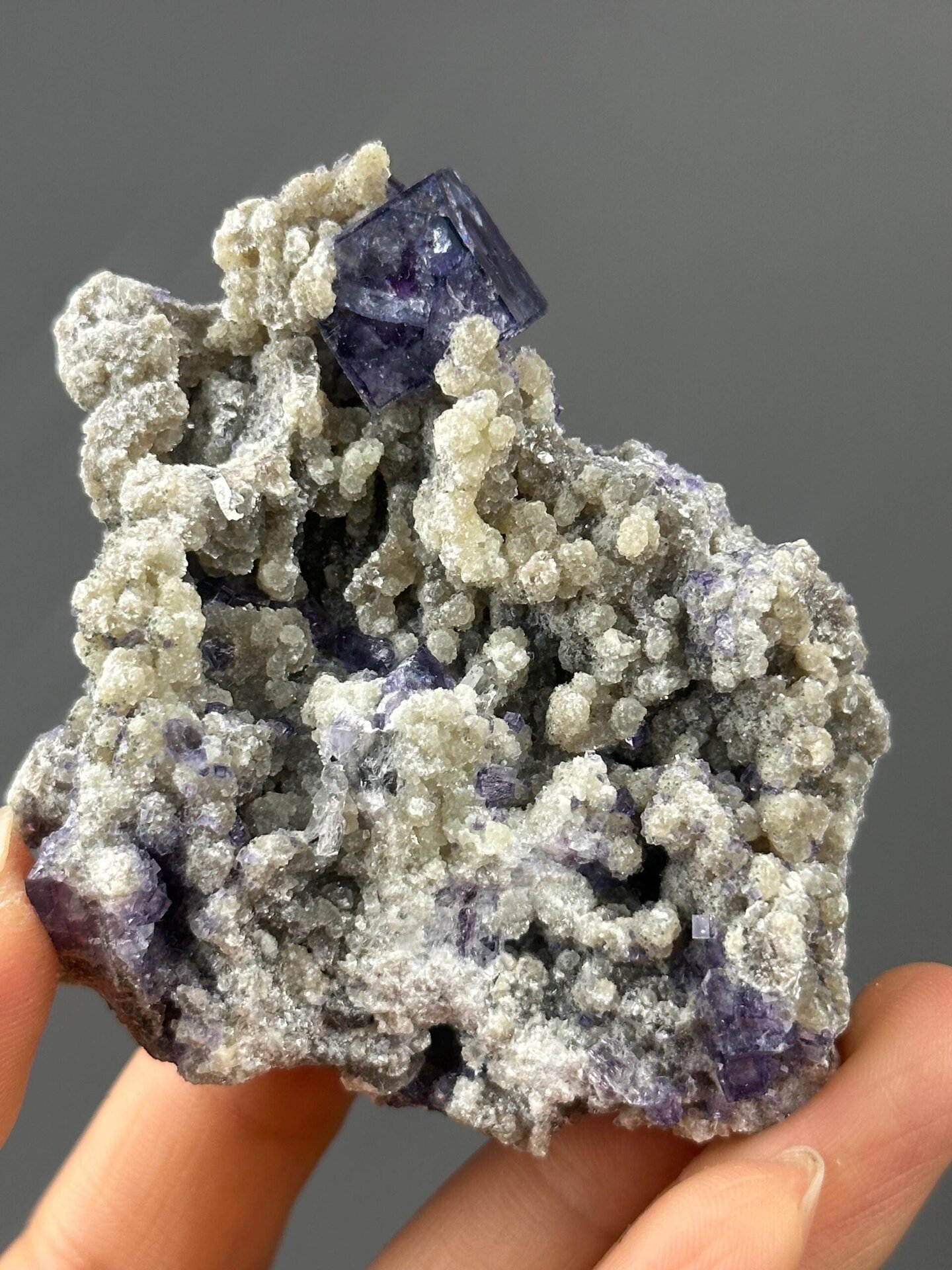 Back view of large phantom fluorite on white matrix, Yaogangxian