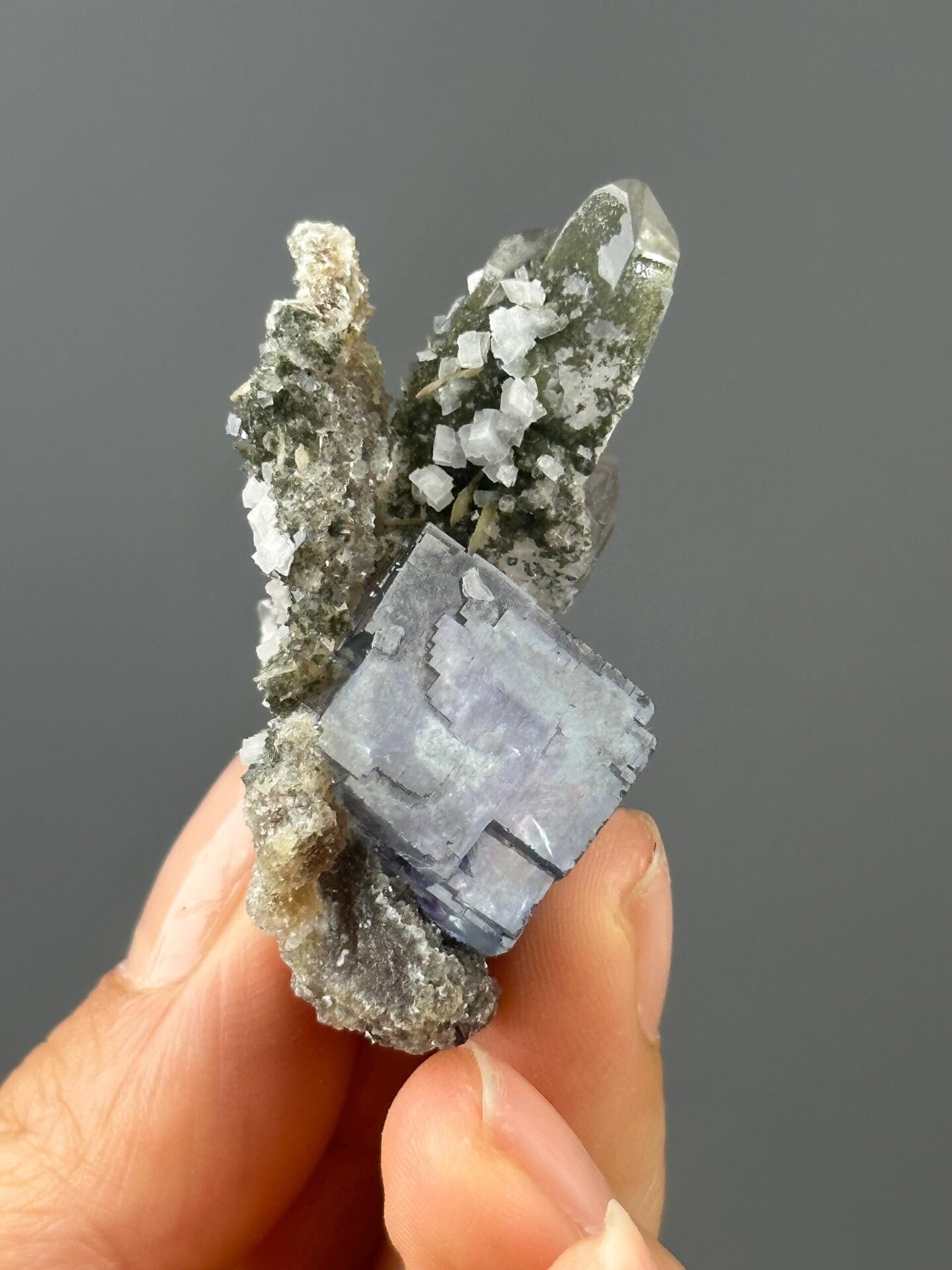 Side view of step fluorite showing phantom bands