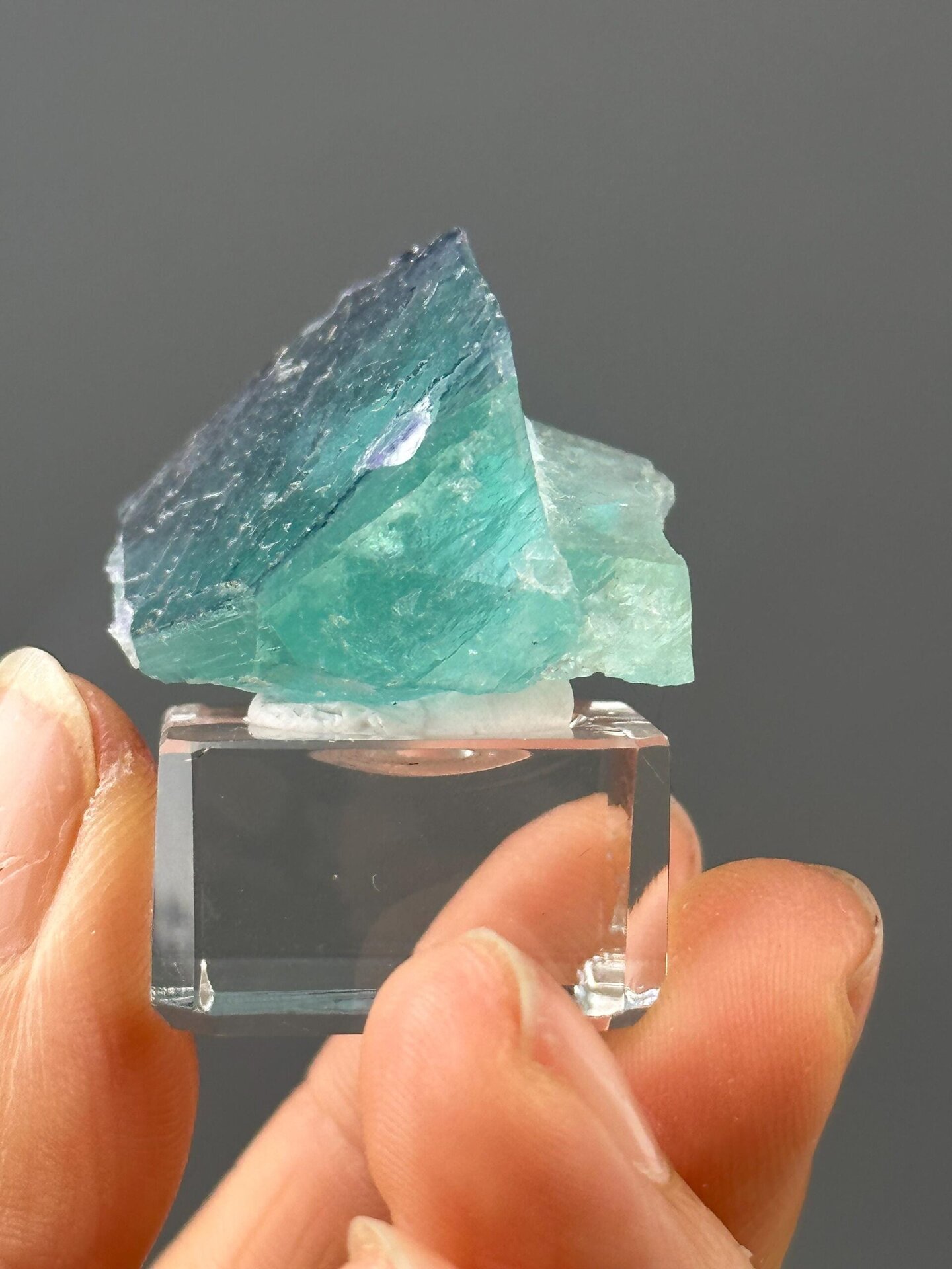 Top view of step growth pattern in turquoise fluorite