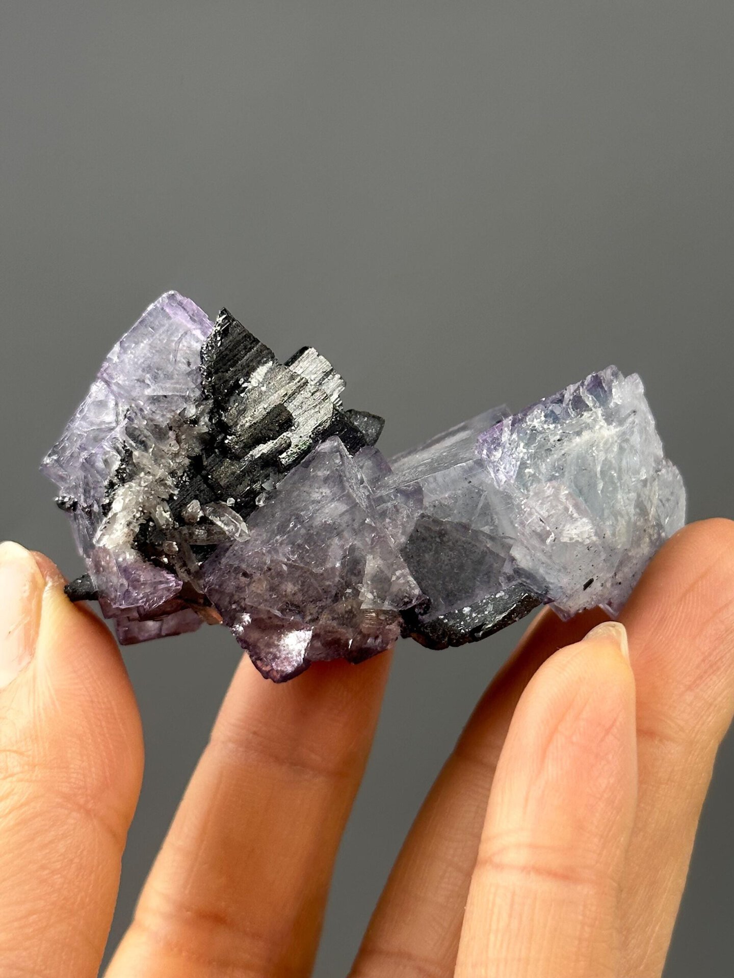 Side view of fluorite-cassiterite specimen, 2.6×1.5×1.1 in