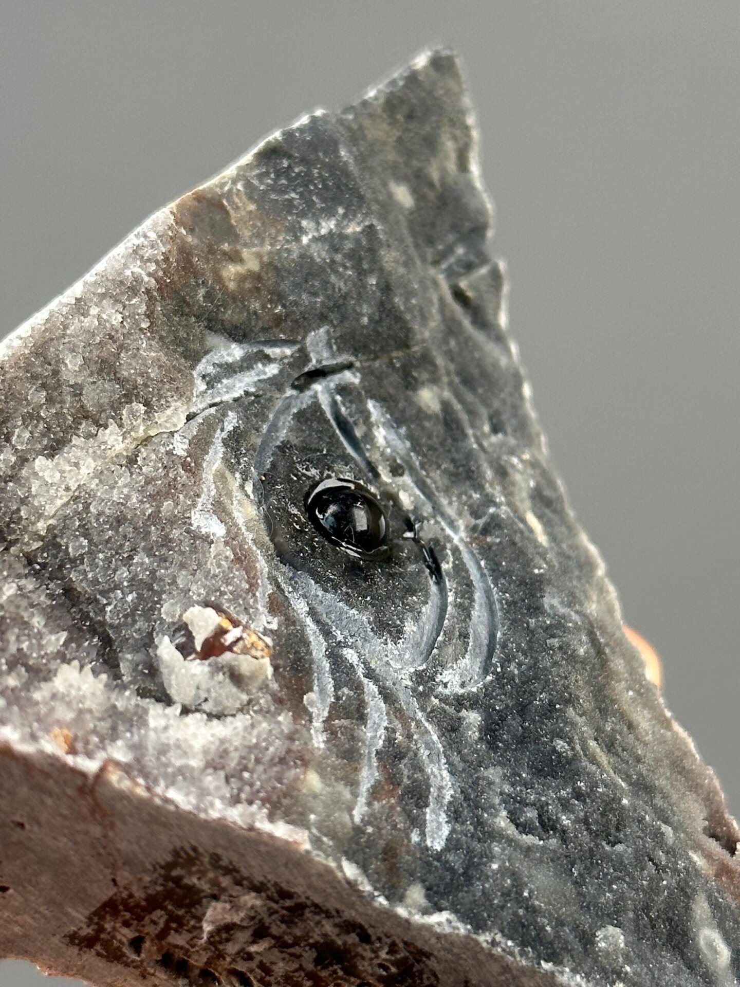 Back view of handcrafted agate-zinc ore pyramid from China