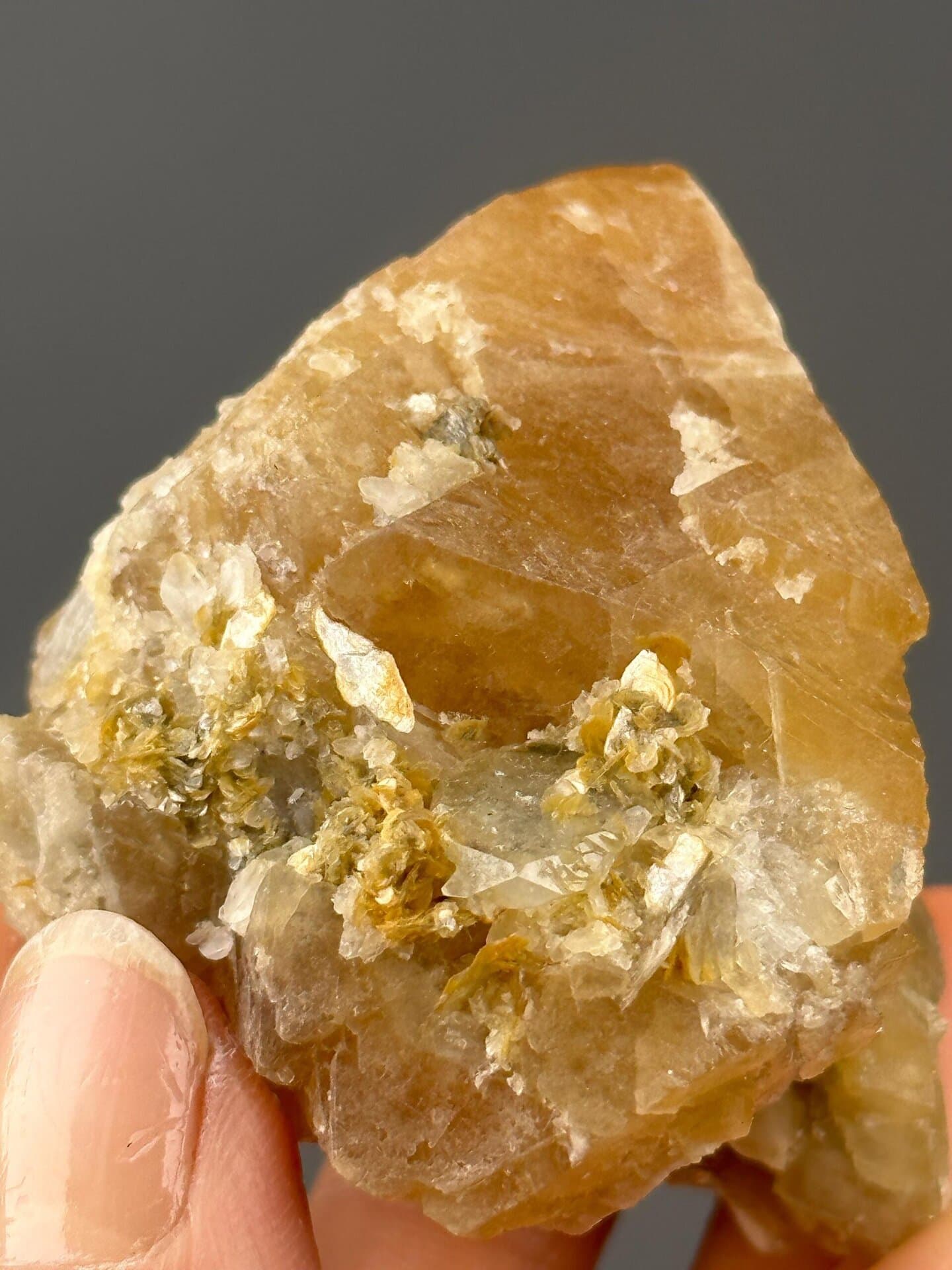 Angled view of orange scheelite cluster