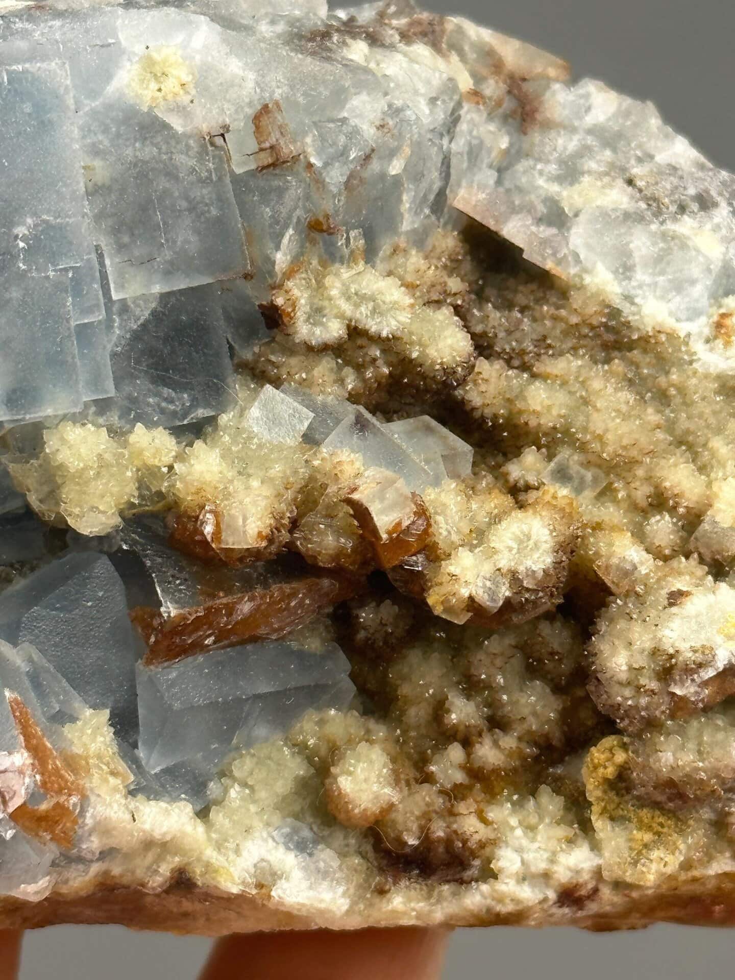 Angled view of blue fluorite on white dolomite