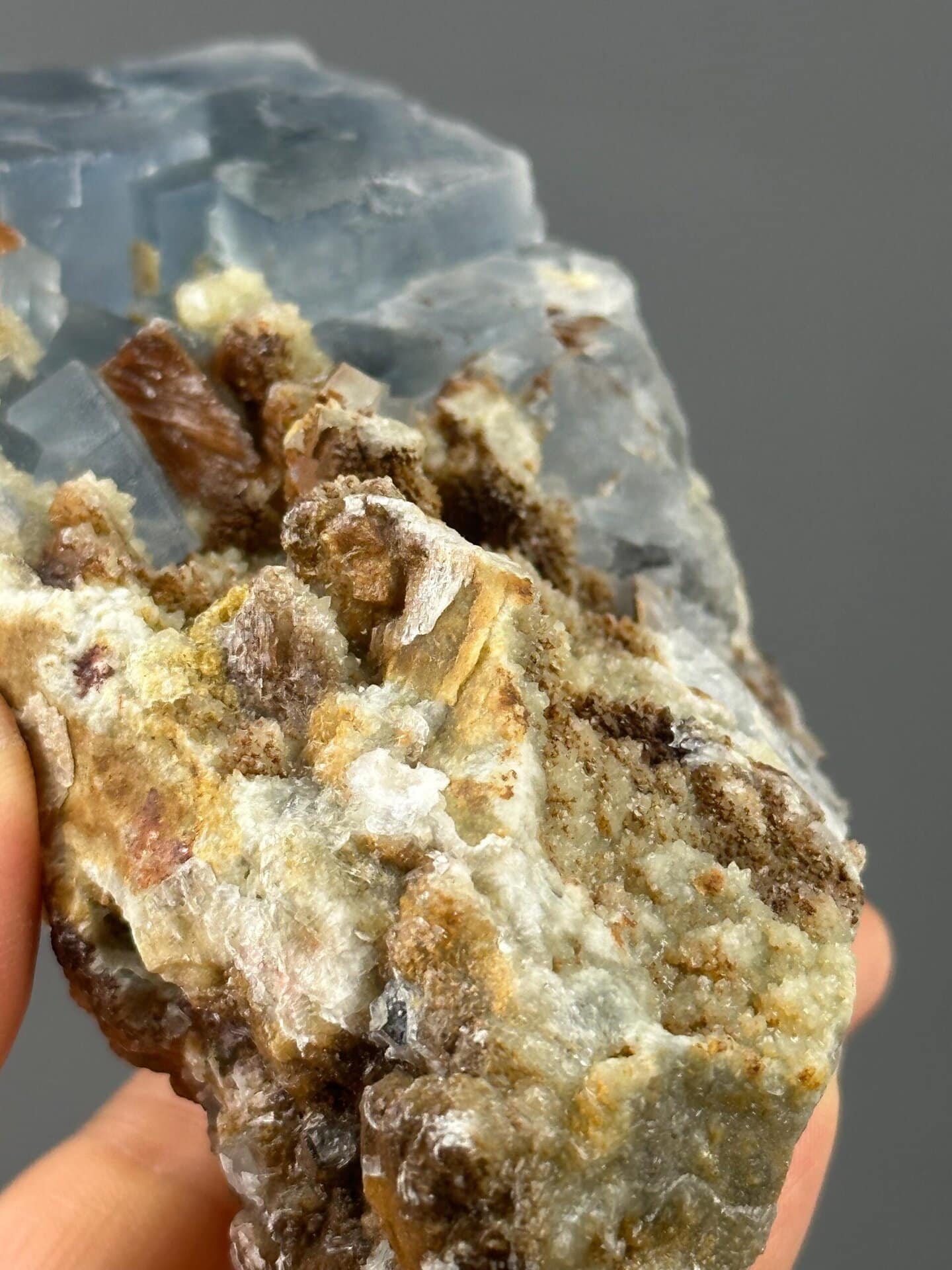 Detail of fluorite crystal surfaces on dolomite matrix