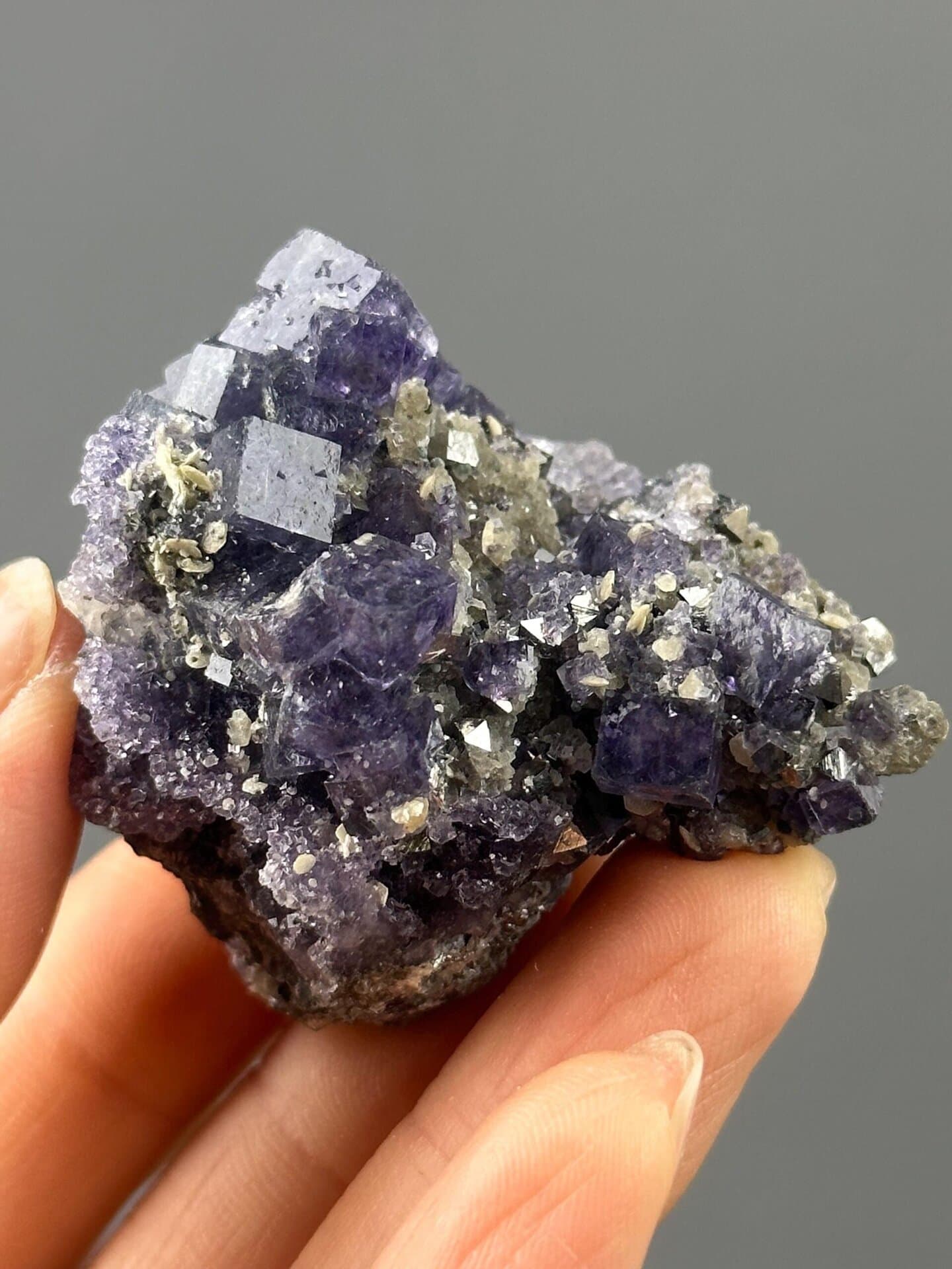 Purple phantom fluorite with subtle zoning on dolomite, Yaogangxian, Hunan