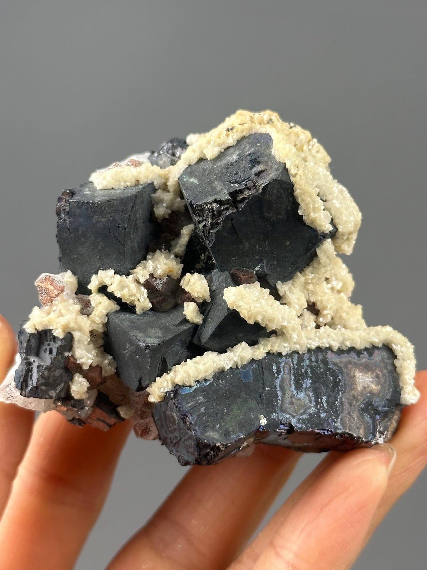 Black iron ore with calcite inclusions from Hunan, China