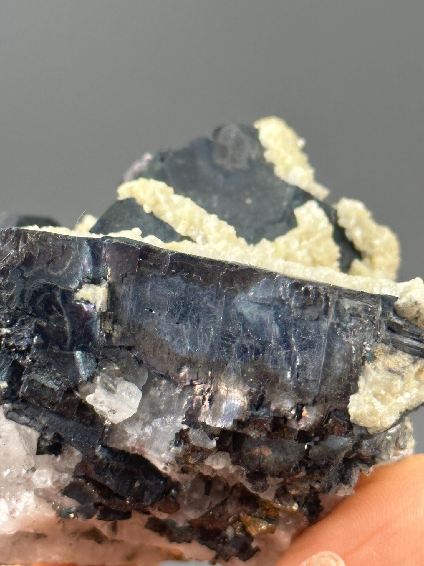 Back view of Hunan black iron ore with calcite specimen