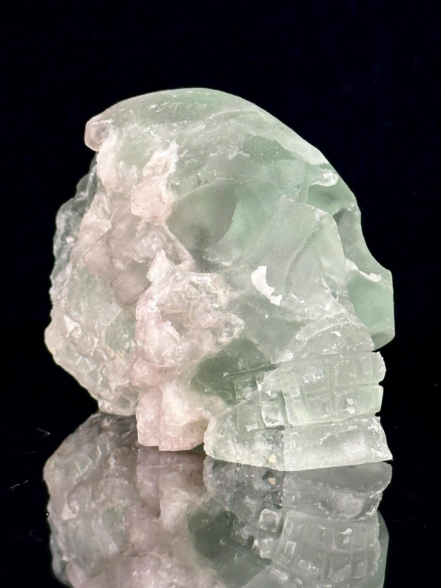 Front view of green fluorite skull carving, 3.8×2.9×2.4 in