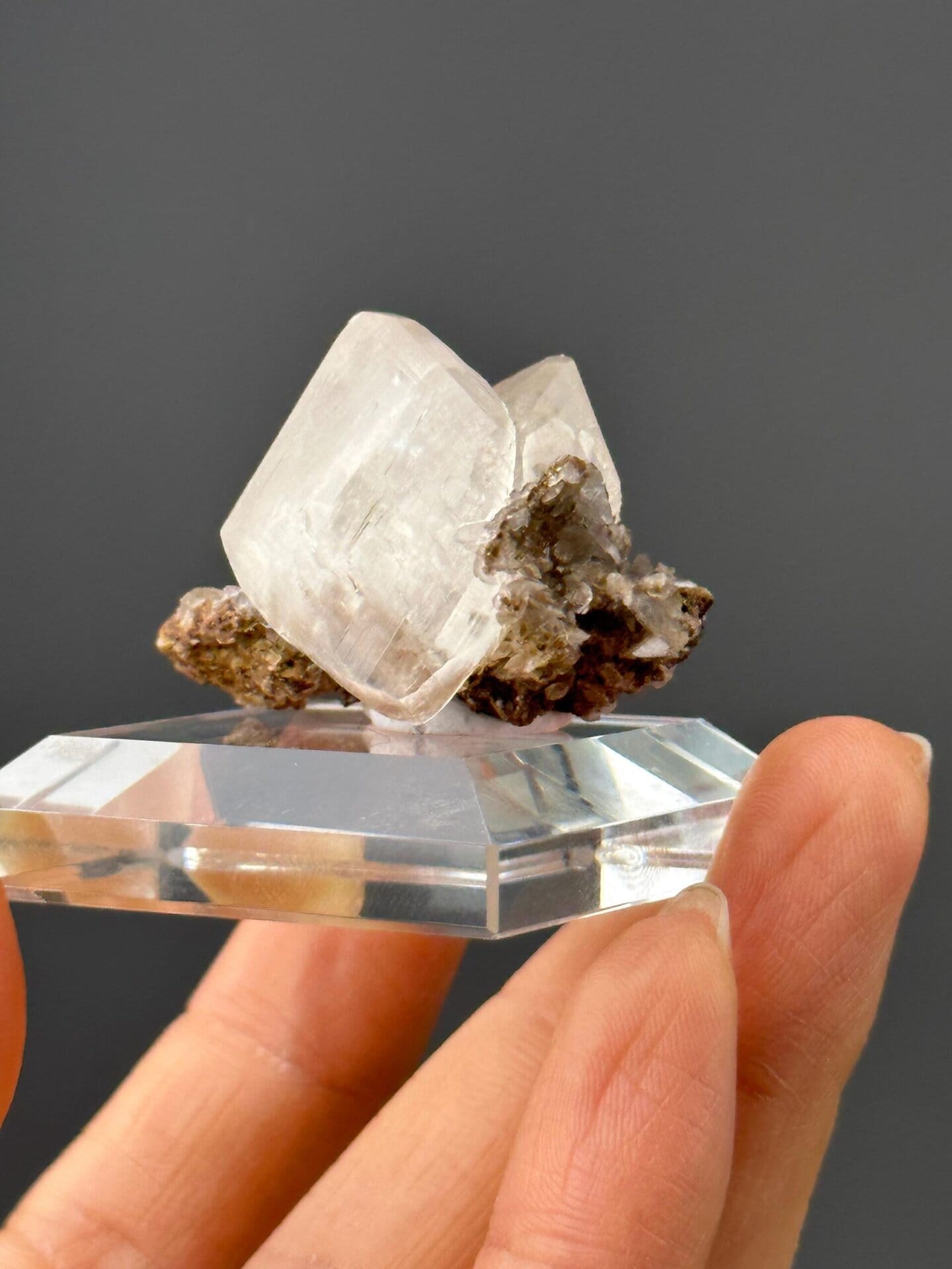 Angled view of calcite crystal on rock matrix