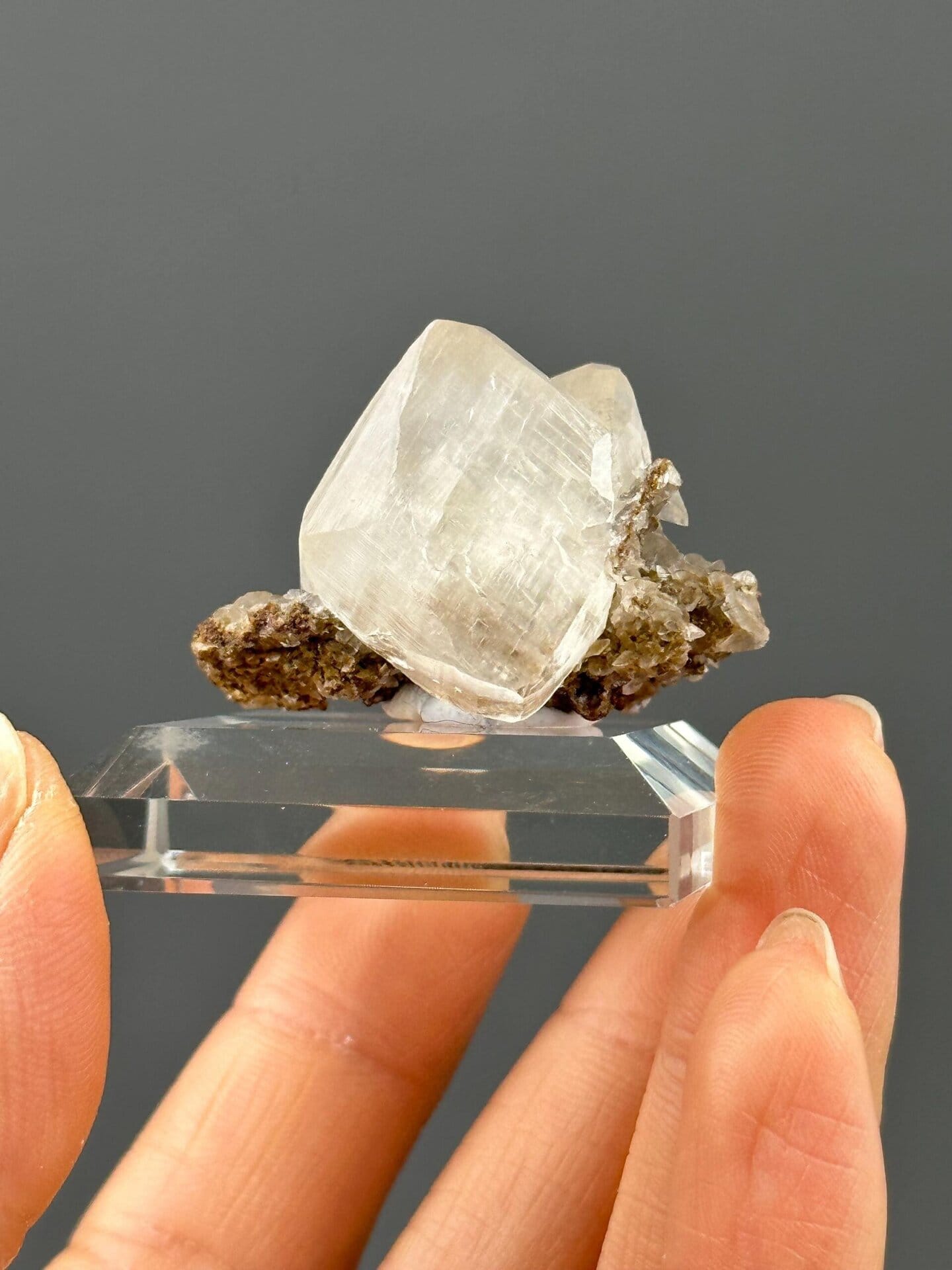 Back view of Hunan calcite crystal on matrix specimen