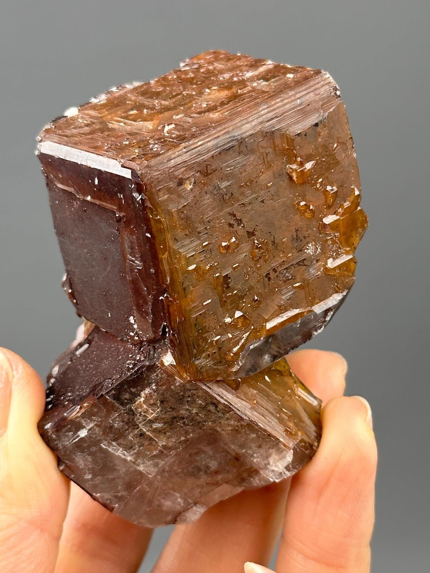Front view of chocolate calcite twin showing etched faces