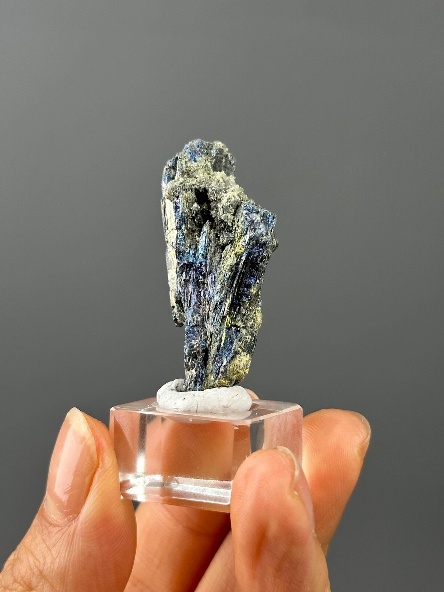 Detail of stibnite surface showing colour variation