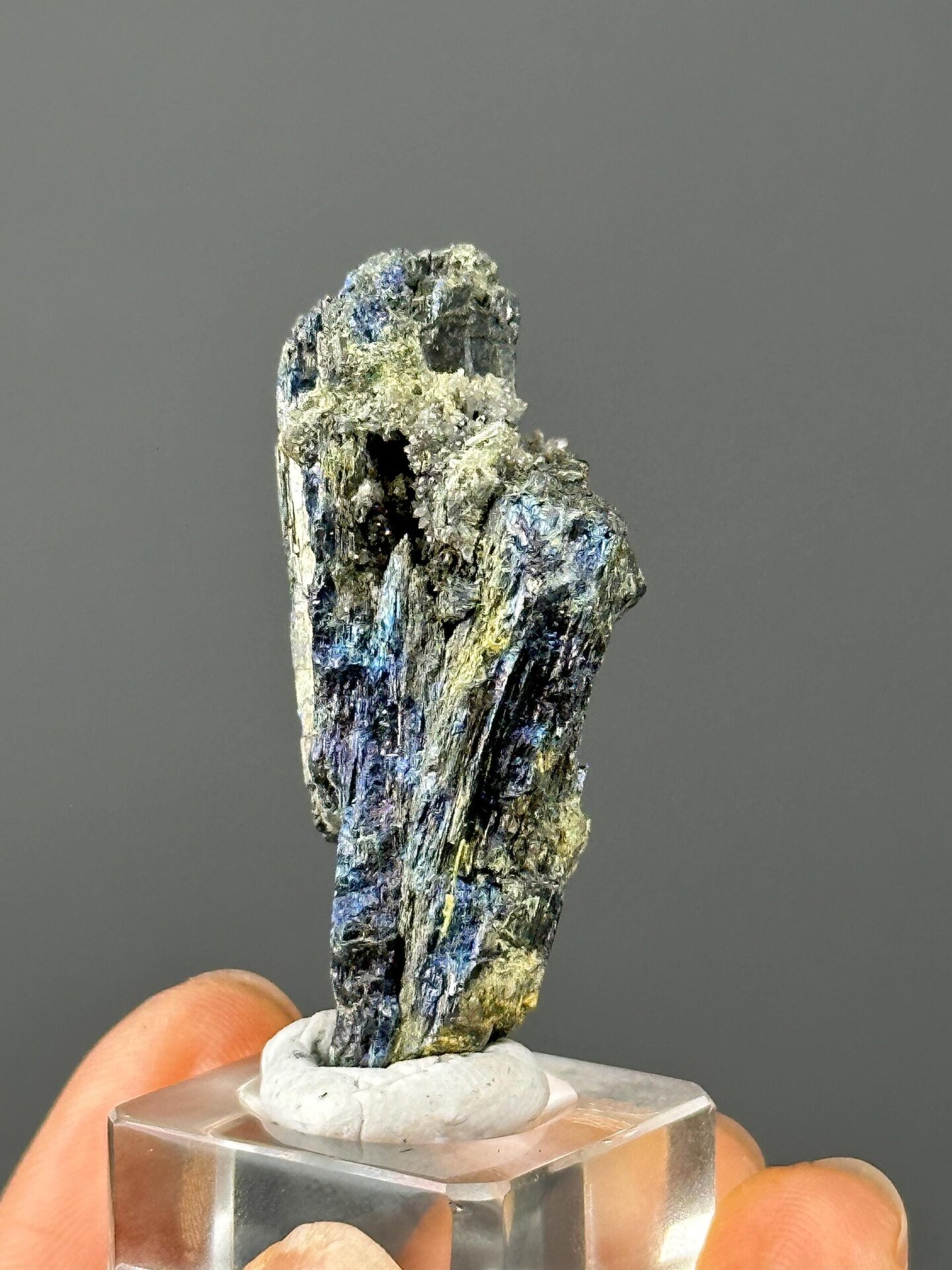 Raw stibnite crystal with iridescent metallic luster from Hunan, China