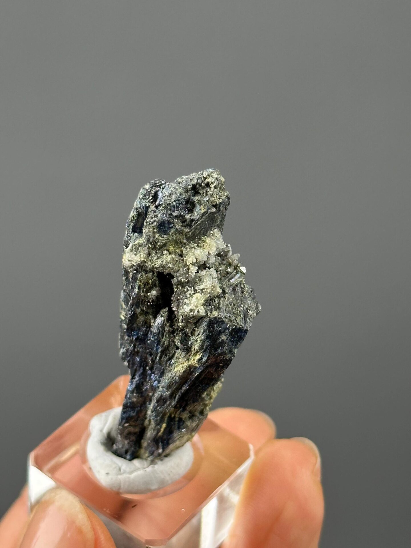 Iridescent metallic stibnite crystal from Hunan, China