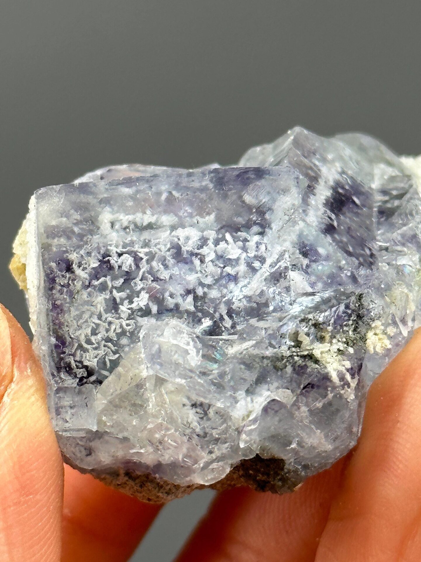 Front view of purple fluorite showing phantom growth bands