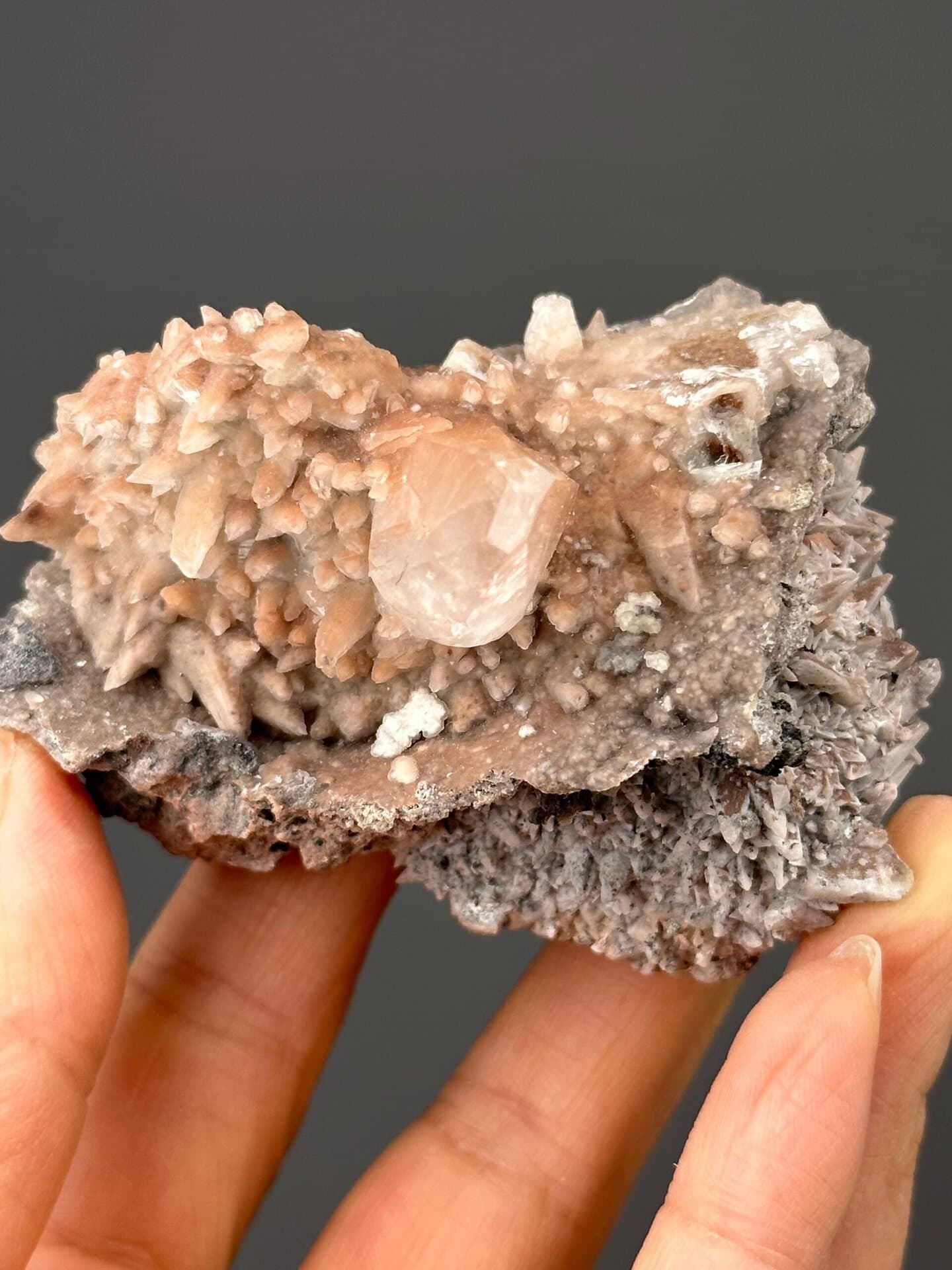 Side view of calcite specimen showing translucent crystals