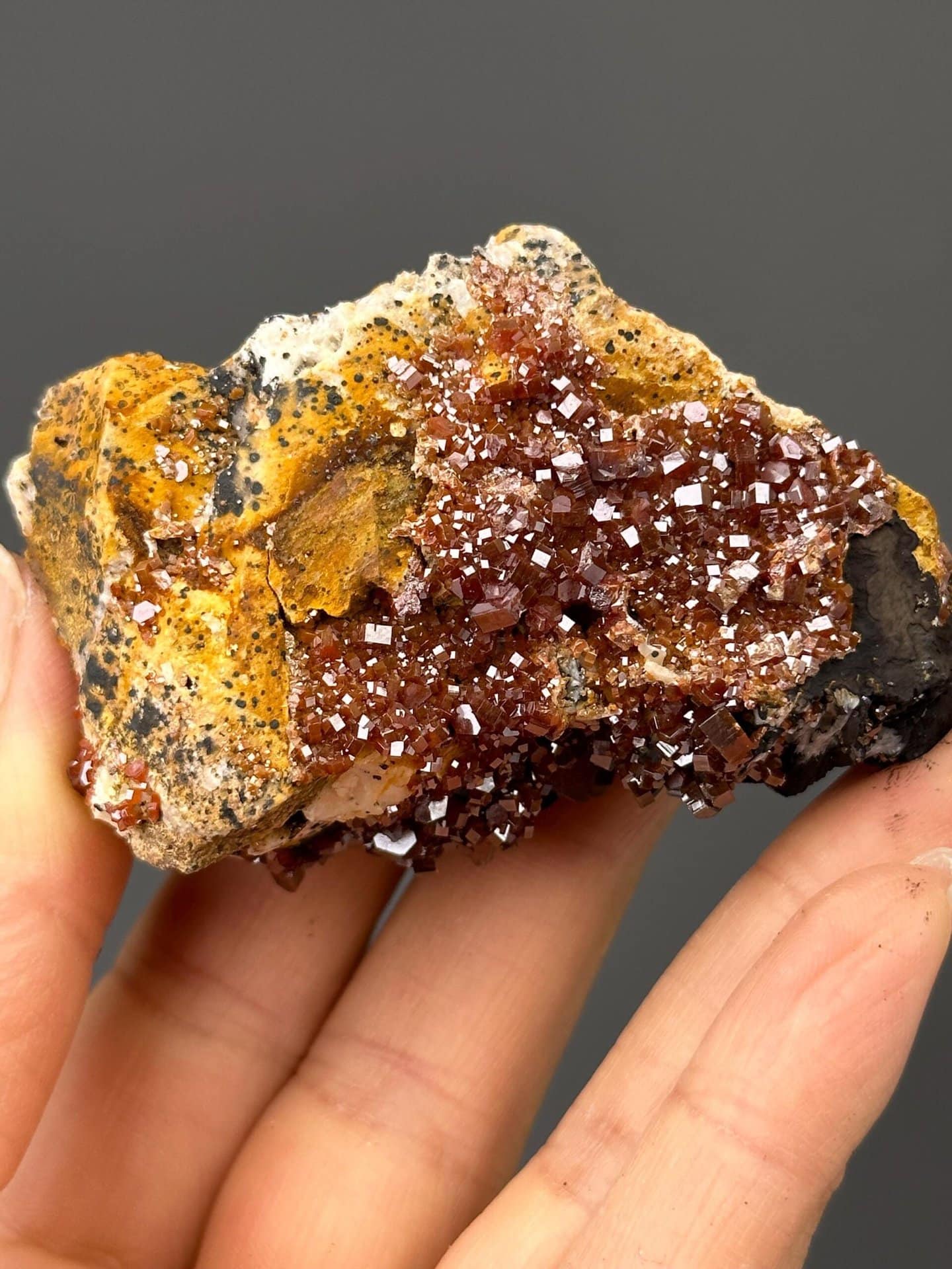 Close-up of vanadinite crystals showing adamantine luster