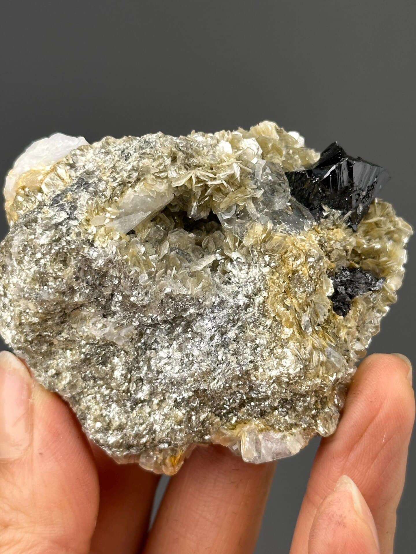 Shimmering mica and aquamarine with cassiterite, Xuebaoding