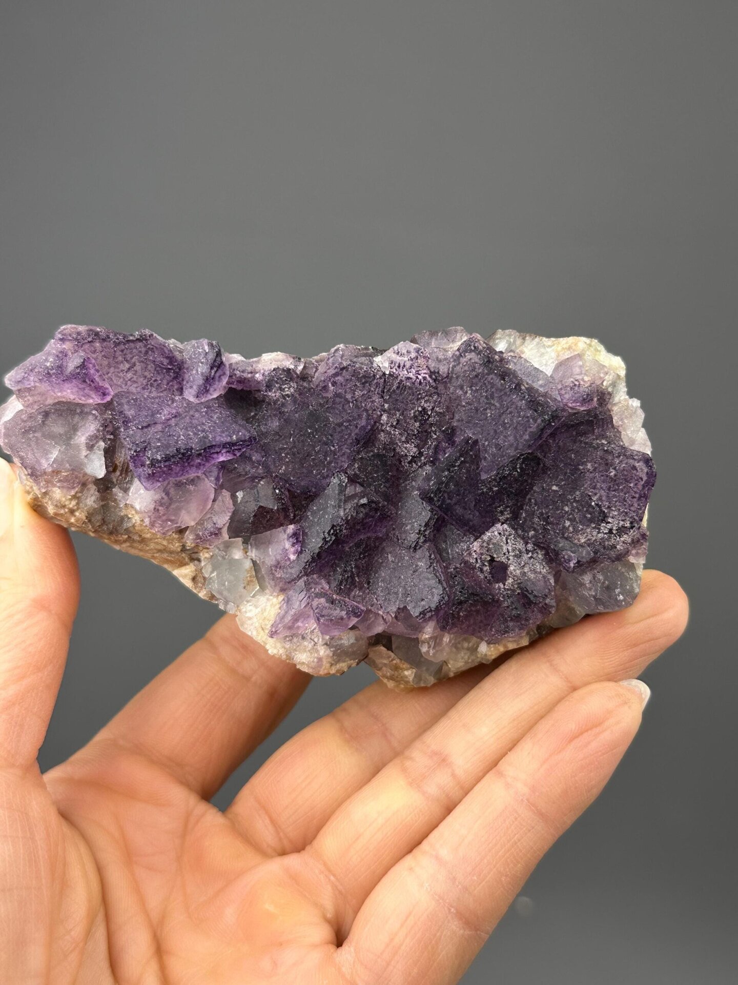 Purple fluorite cluster on quartz matrix from Guizhou, China